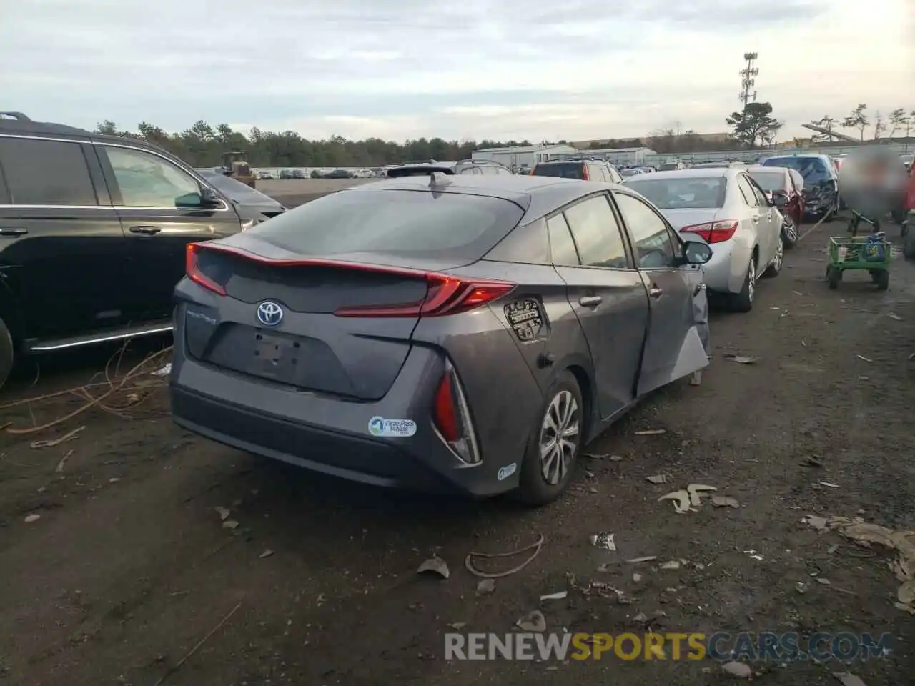 4 Photograph of a damaged car JTDKAMFPXM3165835 TOYOTA PRIUS 2021