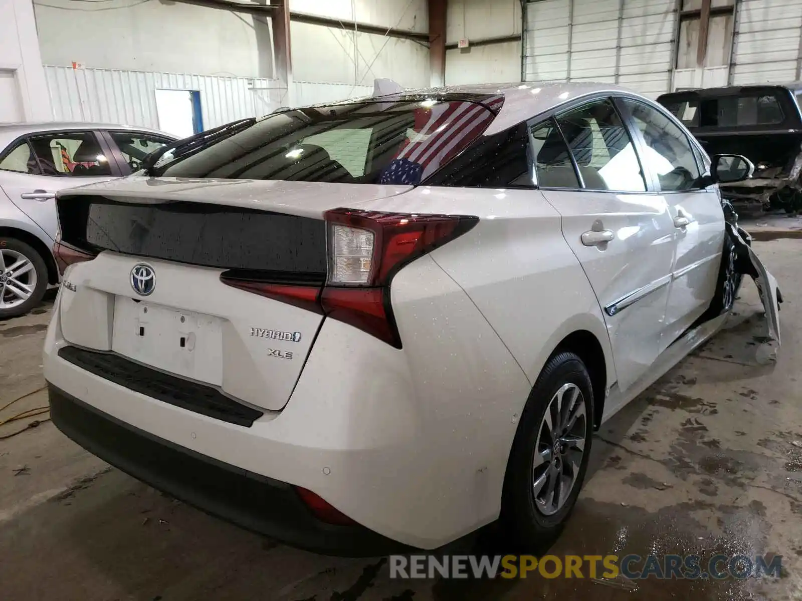 4 Photograph of a damaged car JTDKAMFU3M3132424 TOYOTA PRIUS 2021