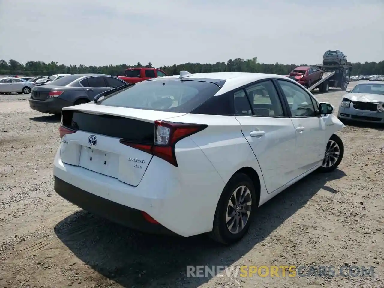 4 Photograph of a damaged car JTDKAMFU4M3127877 TOYOTA PRIUS 2021