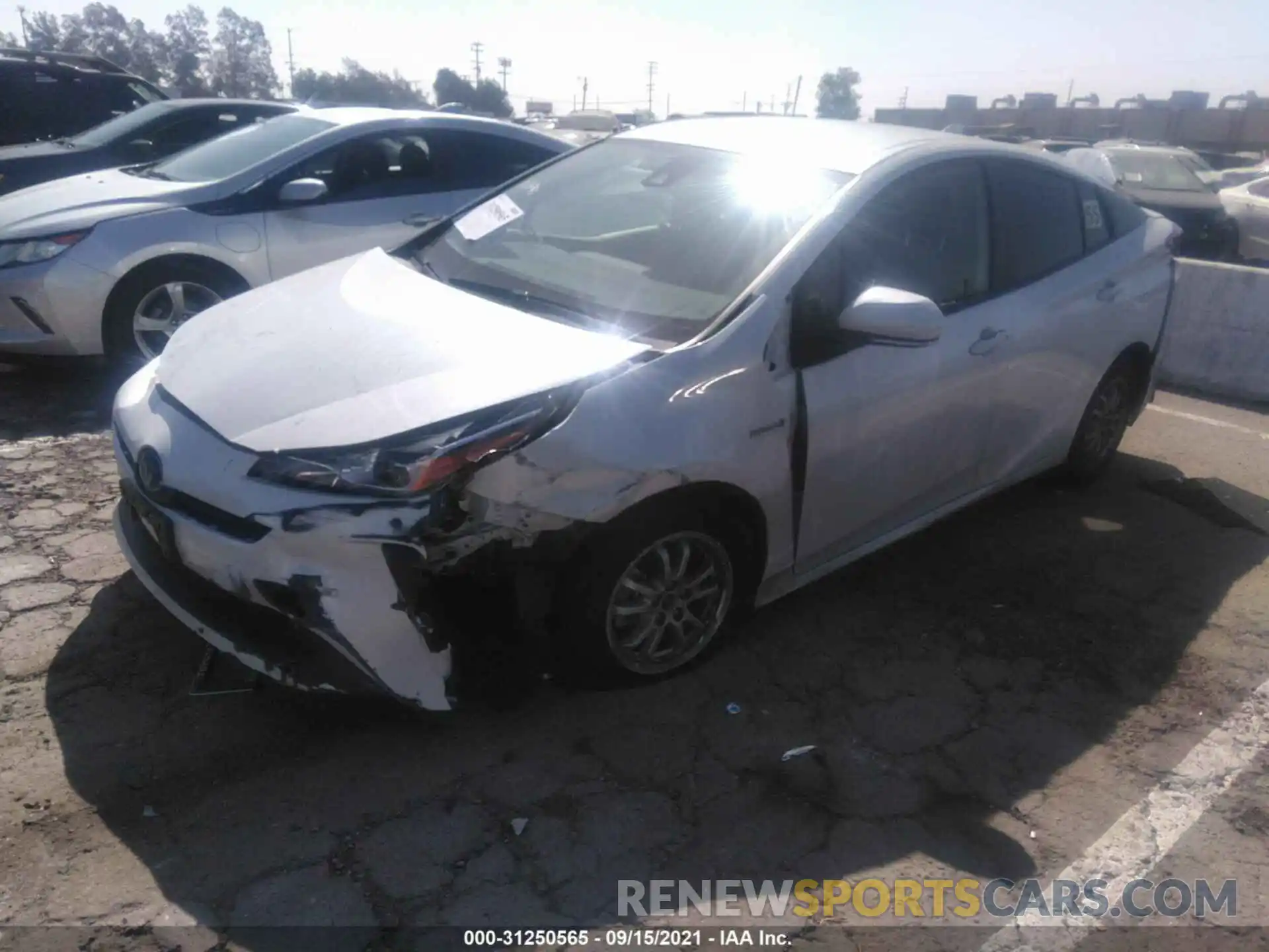 2 Photograph of a damaged car JTDKAMFU4M3130665 TOYOTA PRIUS 2021