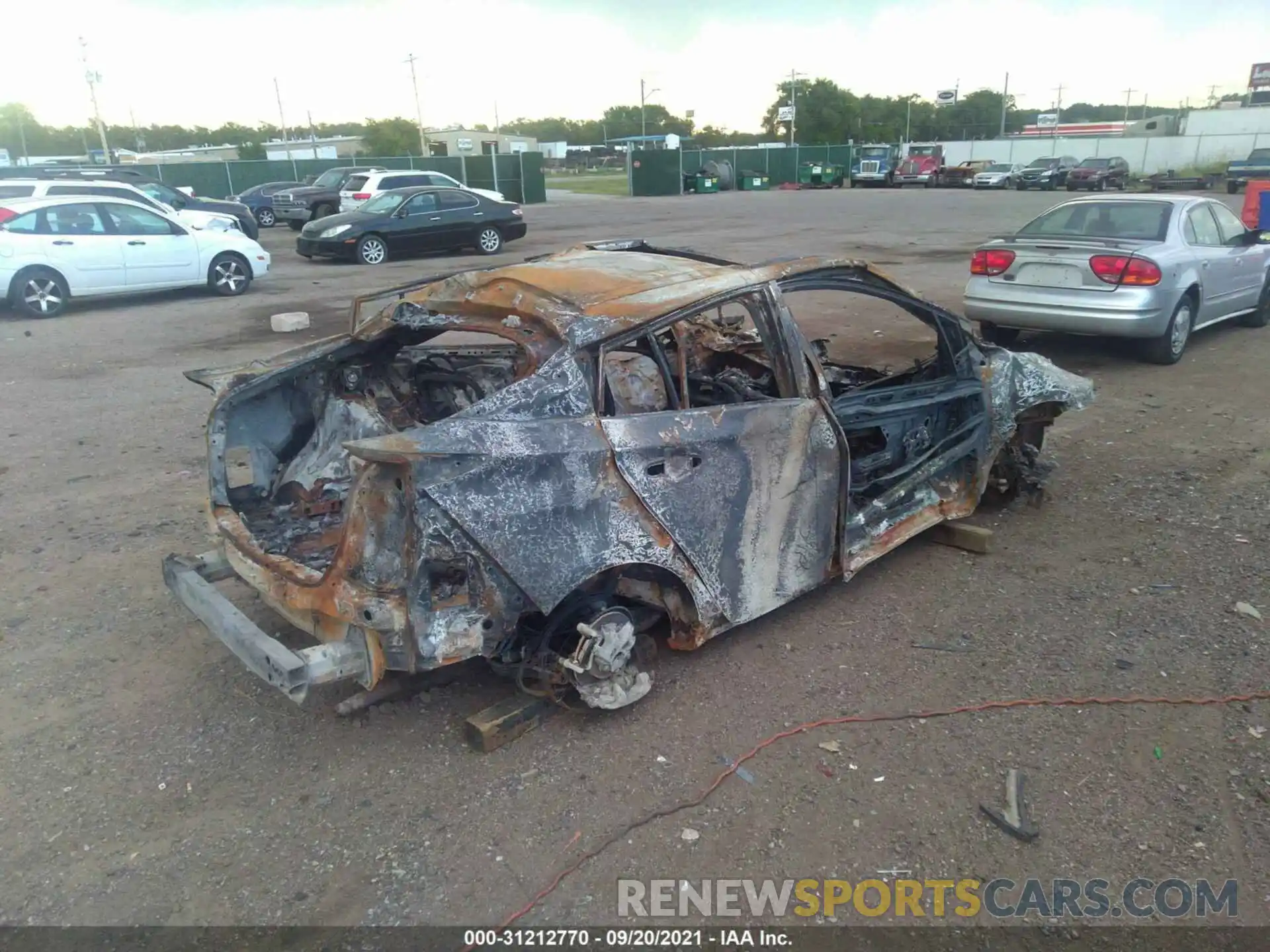 4 Photograph of a damaged car JTDKAMFU6M3141778 TOYOTA PRIUS 2021