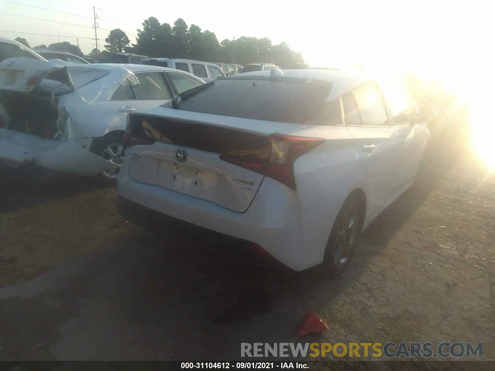 4 Photograph of a damaged car JTDKAMFUXM3143047 TOYOTA PRIUS 2021