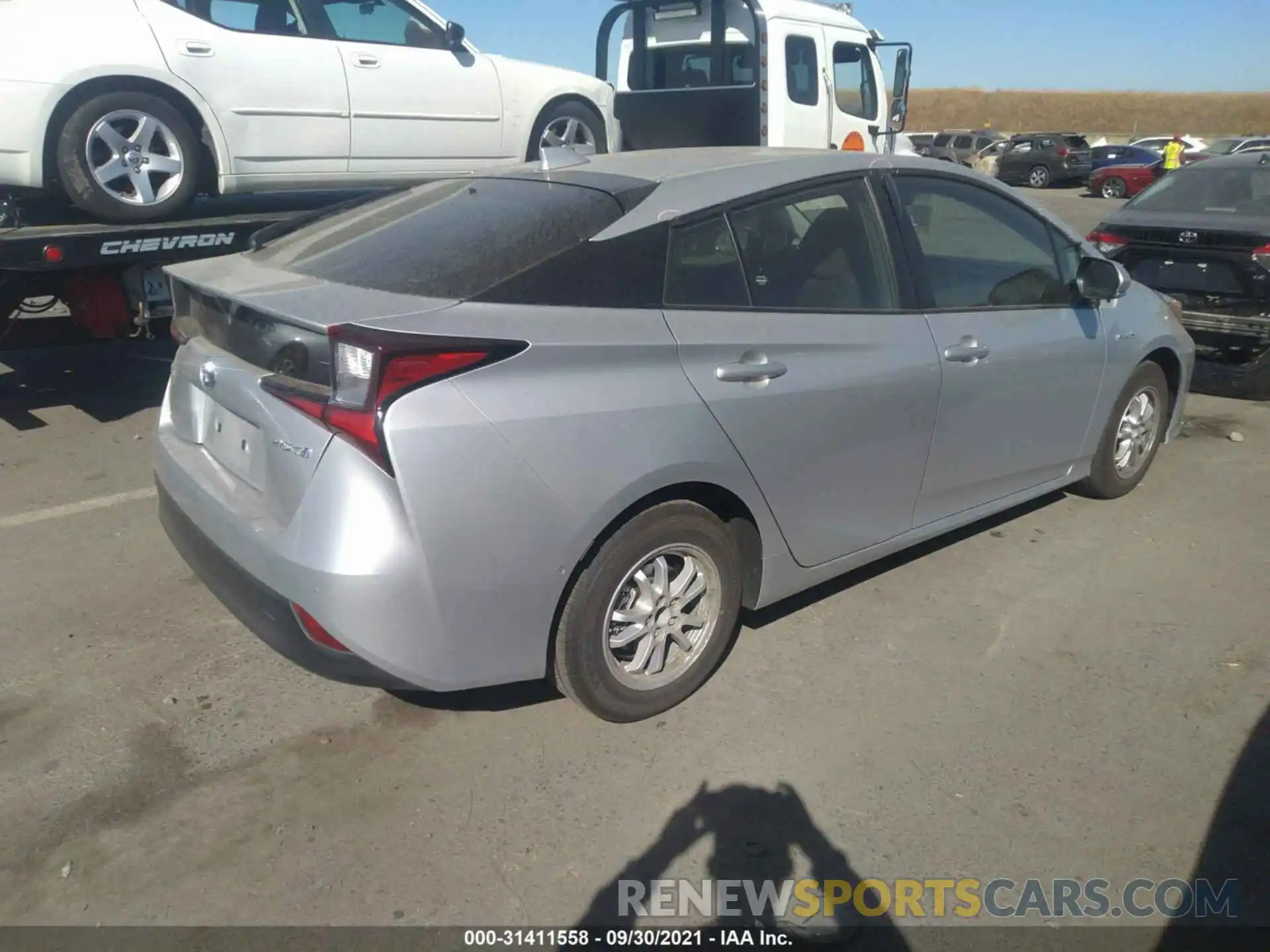 4 Photograph of a damaged car JTDKAMFUXM3150628 TOYOTA PRIUS 2021