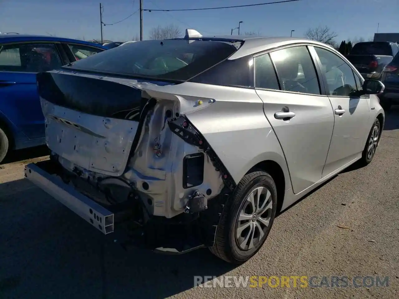 4 Photograph of a damaged car JTDL9MFU3M3024074 TOYOTA PRIUS 2021