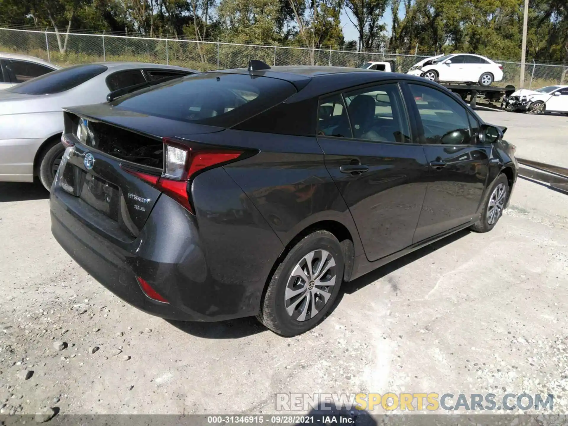 4 Photograph of a damaged car JTDL9MFU6M3025574 TOYOTA PRIUS 2021