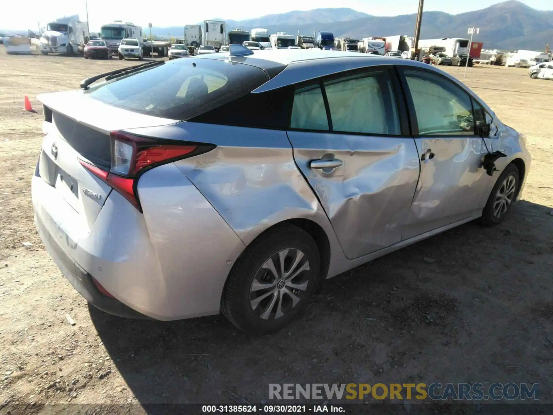 4 Photograph of a damaged car JTDL9MFU9M3026637 TOYOTA PRIUS 2021