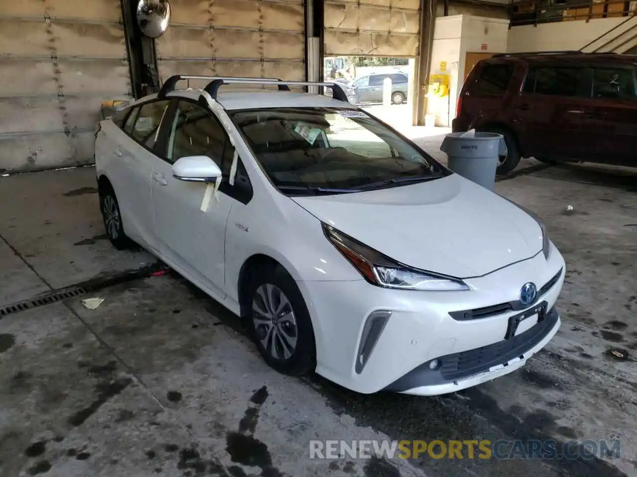 1 Photograph of a damaged car JTDL9MFUXM3027232 TOYOTA PRIUS 2021