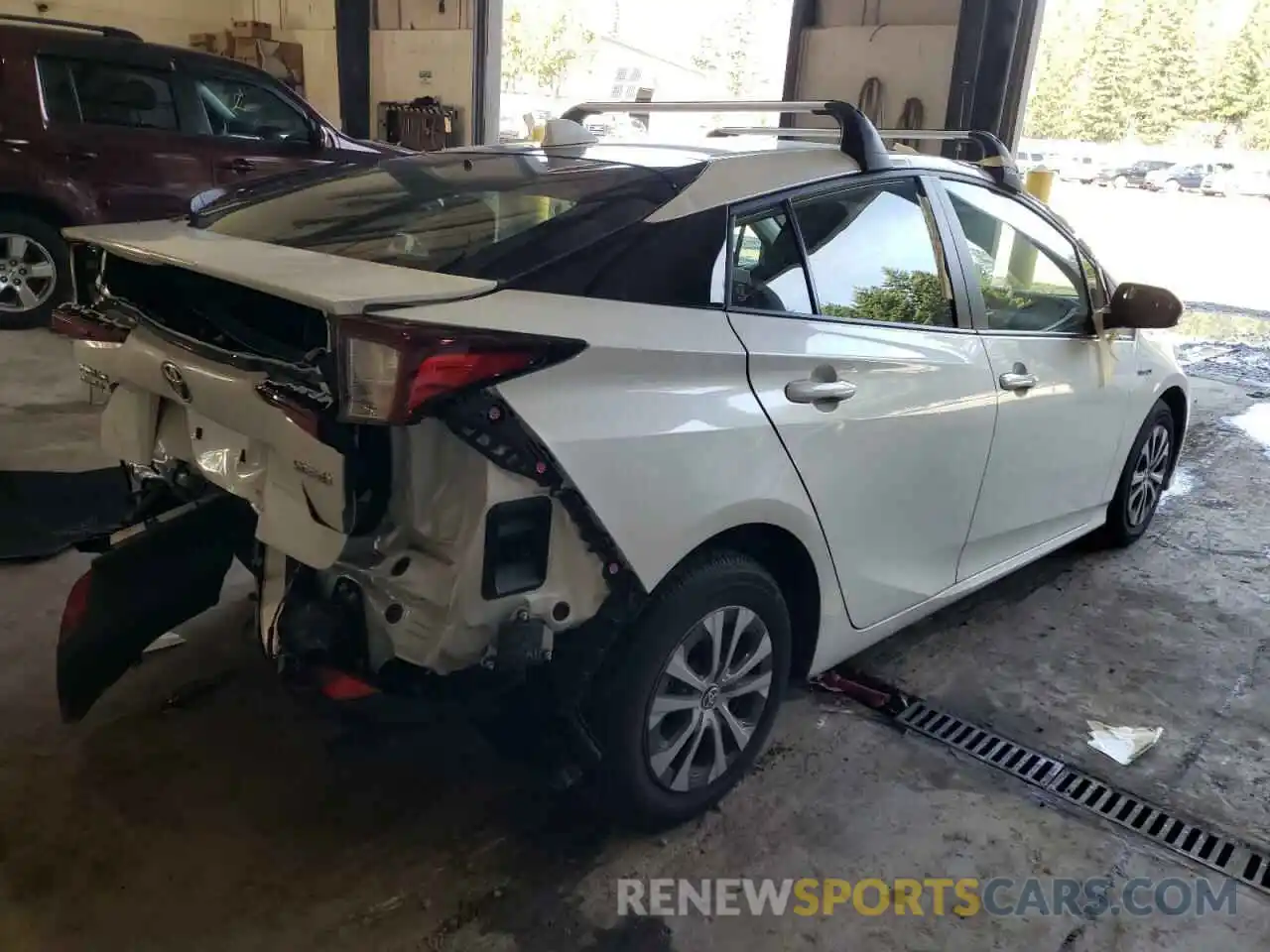 4 Photograph of a damaged car JTDL9MFUXM3027232 TOYOTA PRIUS 2021