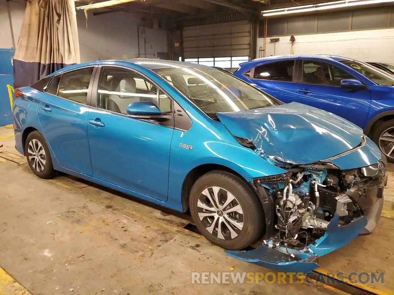 4 Photograph of a damaged car JTDKAMFP2N3216956 TOYOTA PRIUS 2022