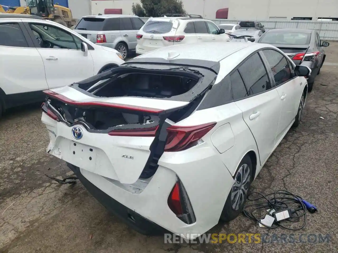 4 Photograph of a damaged car JTDKAMFP5N3203487 TOYOTA PRIUS 2022