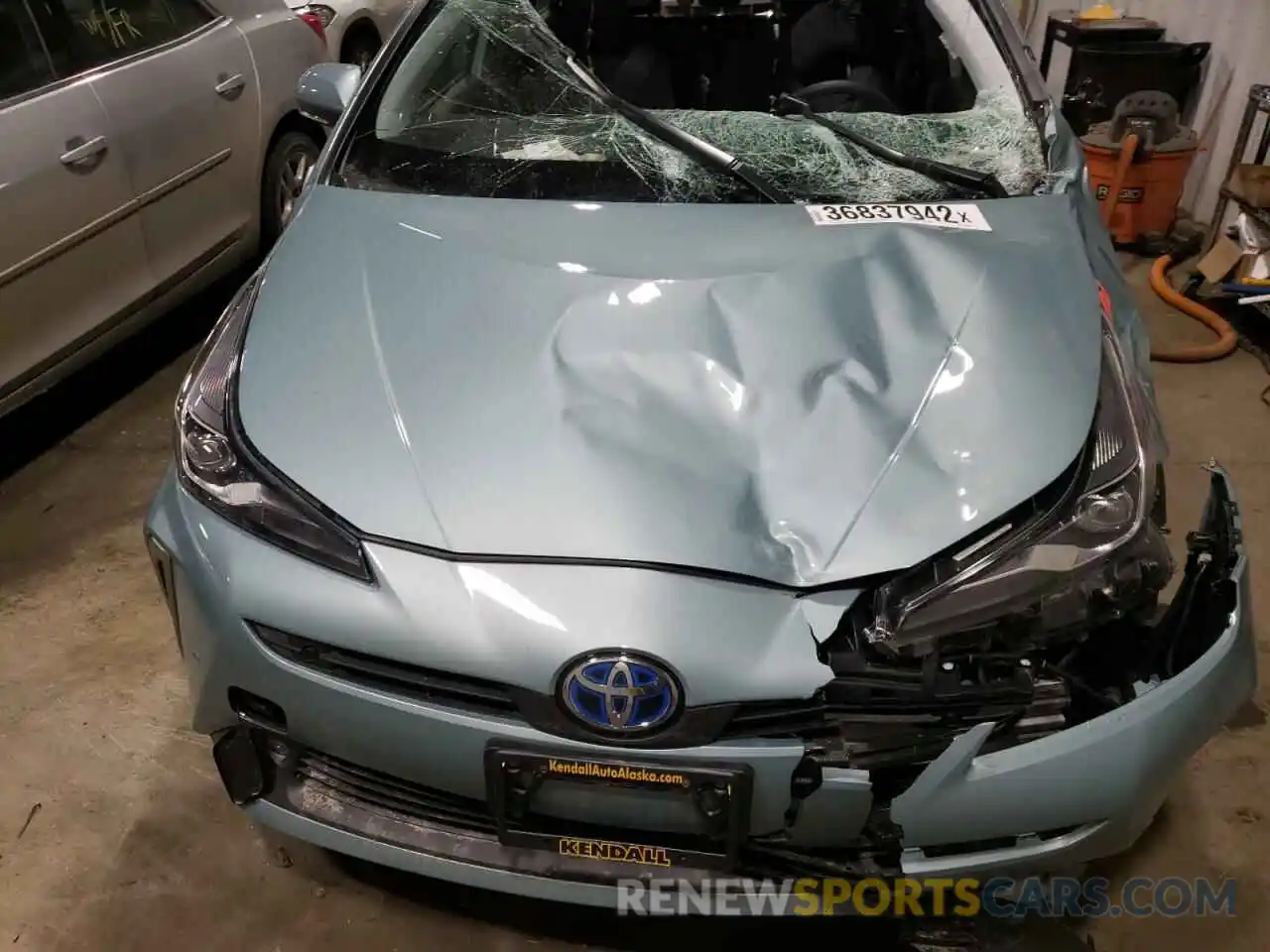 7 Photograph of a damaged car JTDL9MFU1N3033194 TOYOTA PRIUS 2022