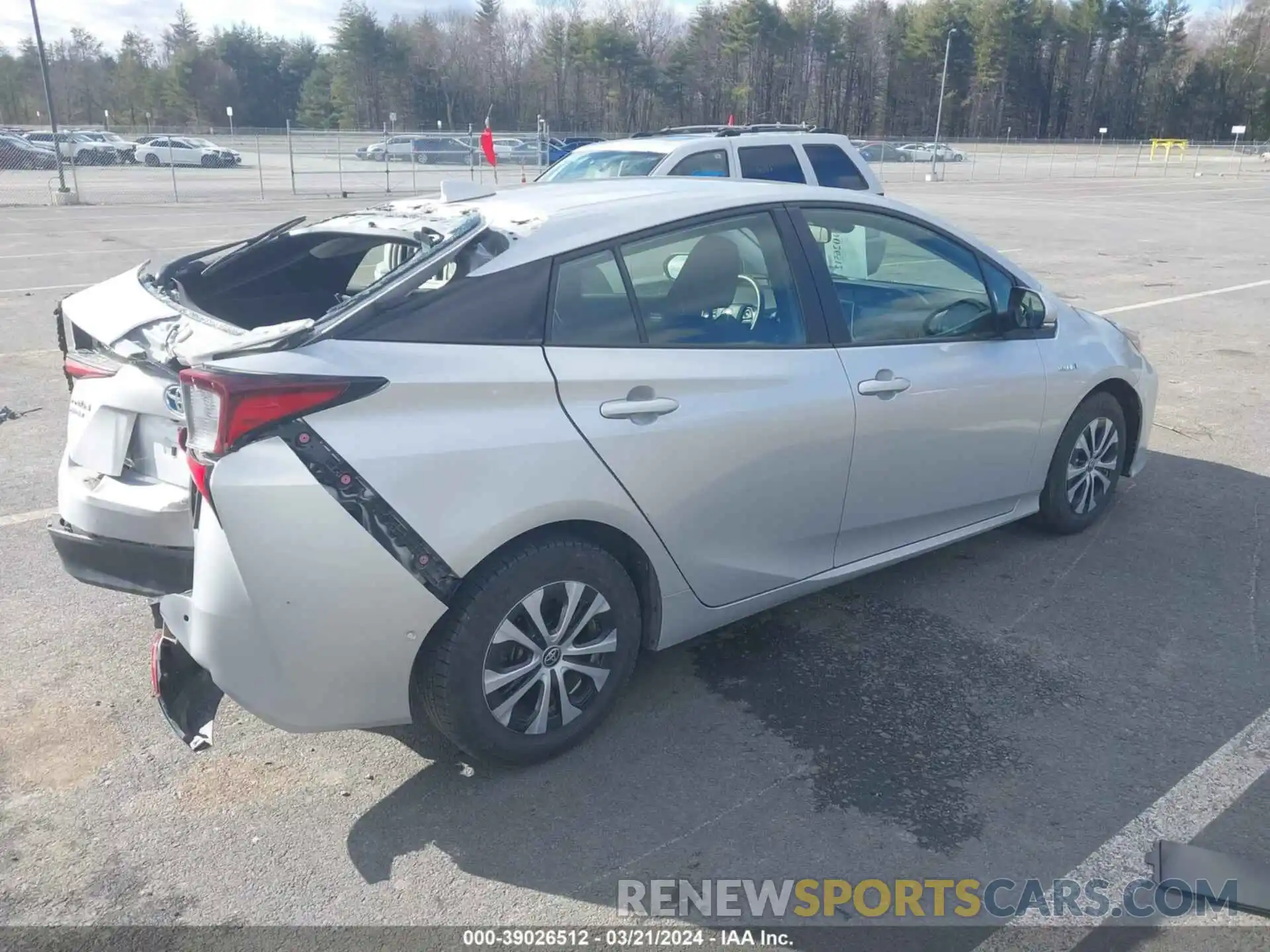 4 Photograph of a damaged car JTDL9MFUXN3037020 TOYOTA PRIUS 2022