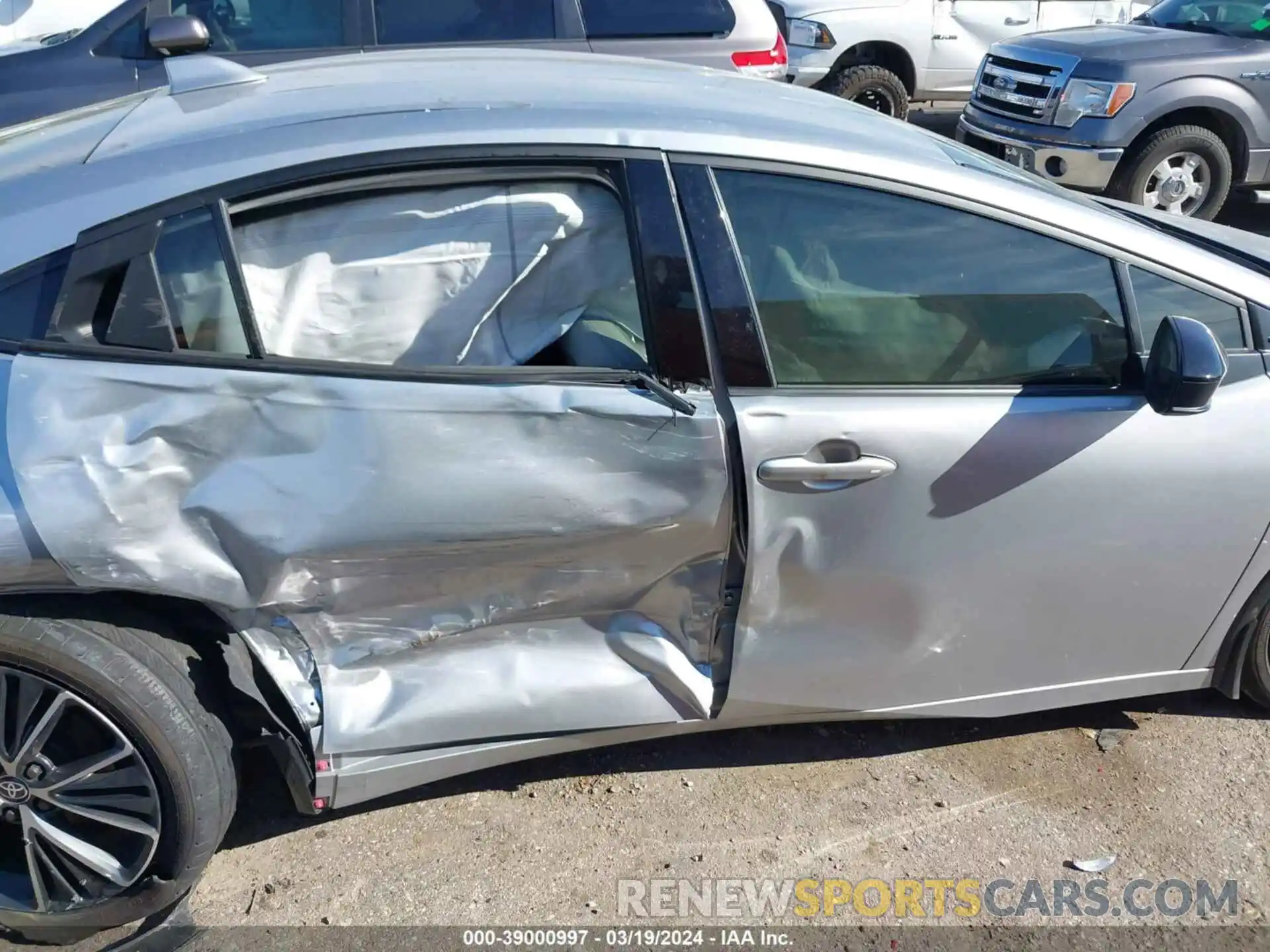 13 Photograph of a damaged car JTDACAAUXP3001748 TOYOTA PRIUS 2023