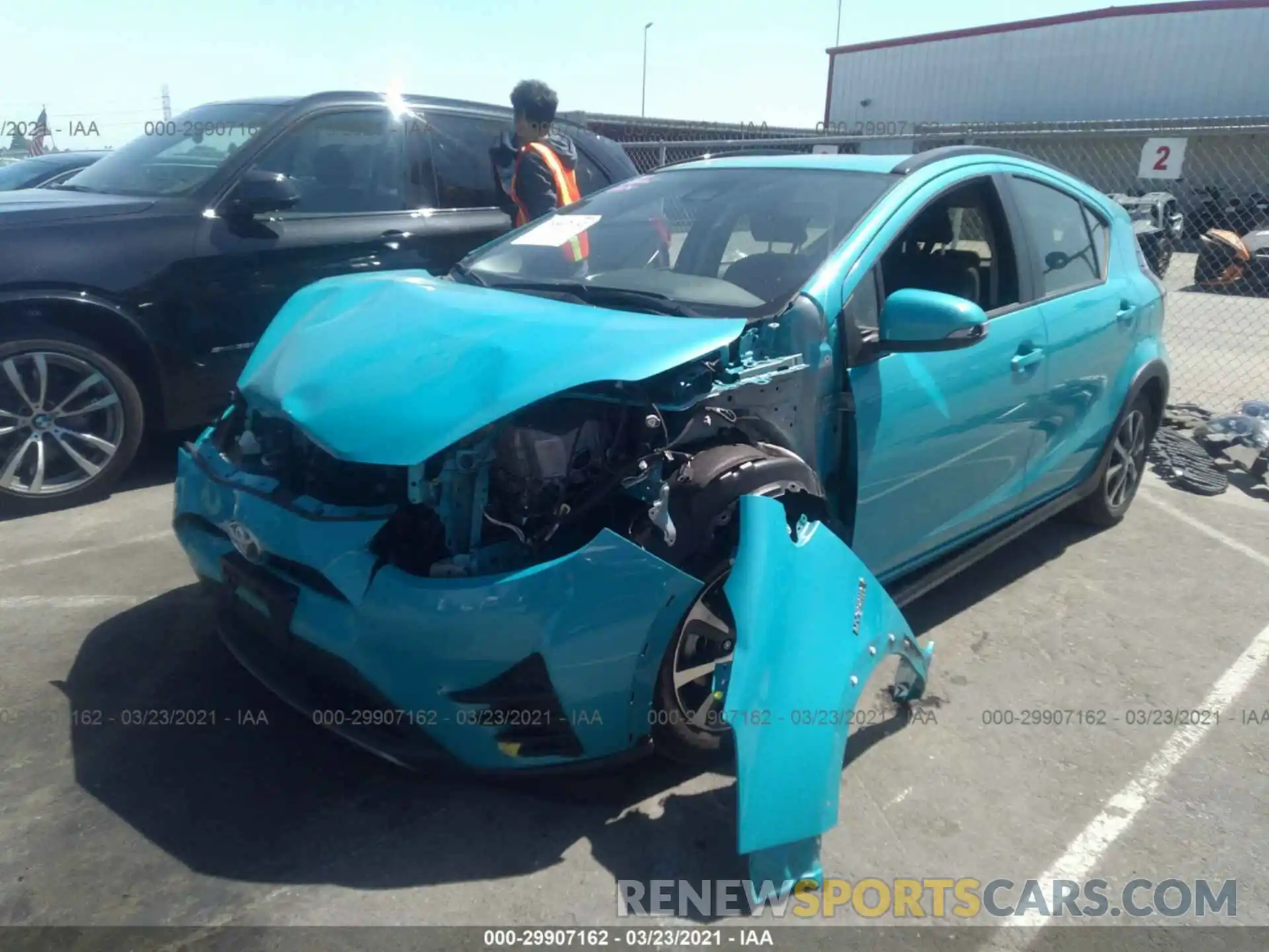 2 Photograph of a damaged car JTDKDTB31K1621203 TOYOTA PRIUS C 2019
