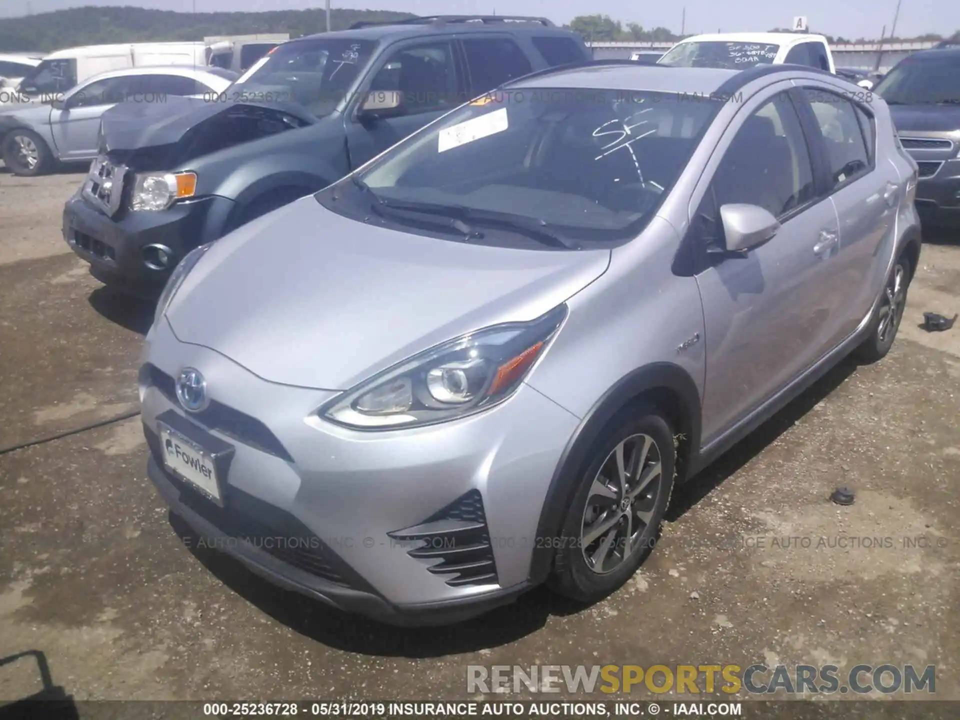 2 Photograph of a damaged car JTDKDTB34K1620725 TOYOTA PRIUS C 2019