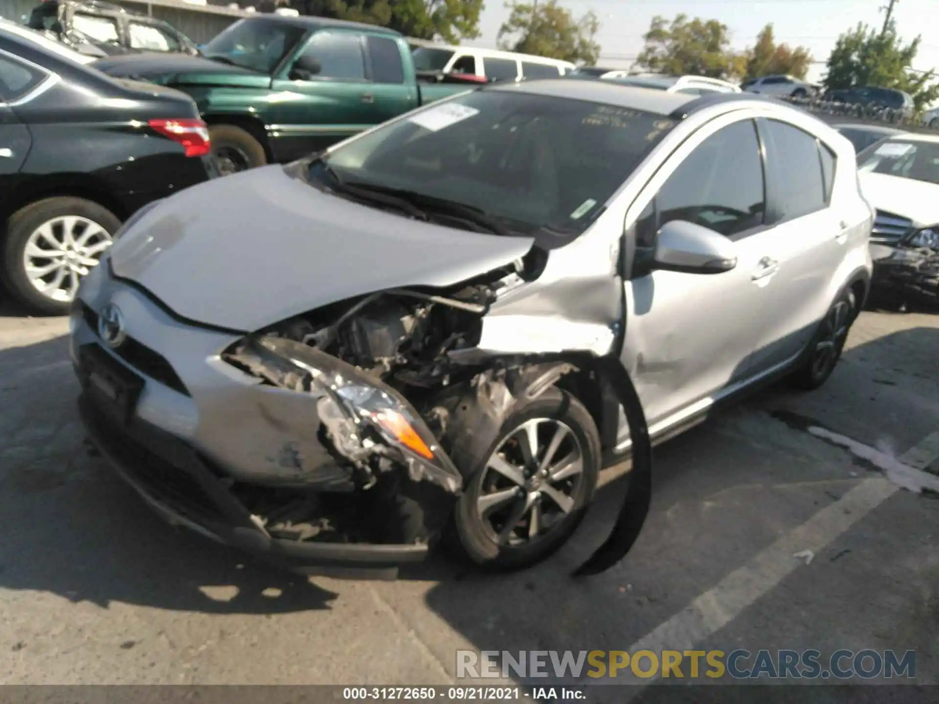 2 Photograph of a damaged car JTDKDTB34K1625682 TOYOTA PRIUS C 2019