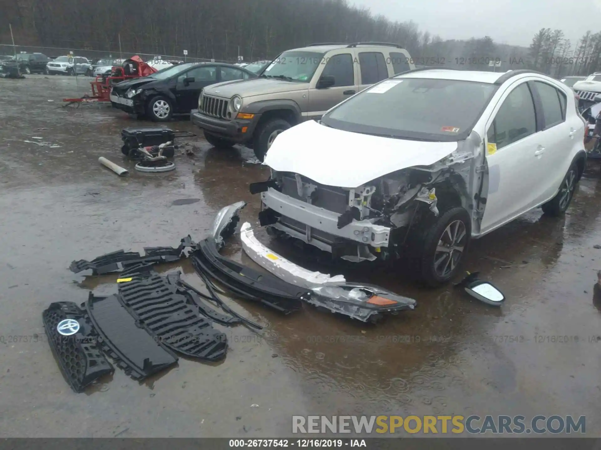 2 Photograph of a damaged car JTDKDTB37K1624266 TOYOTA PRIUS C 2019