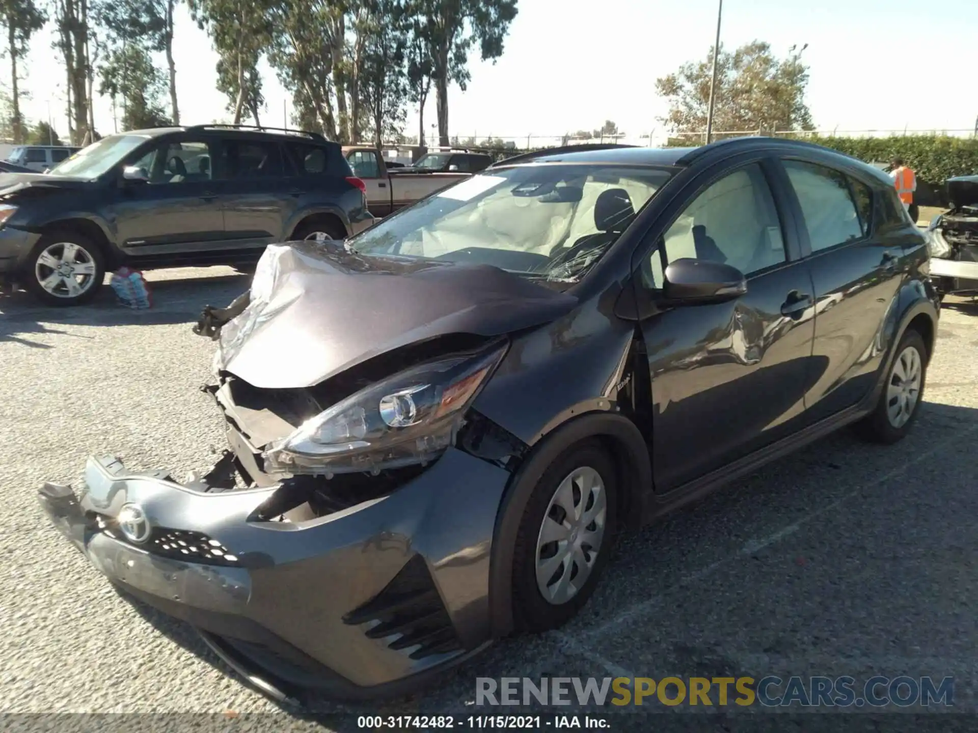 2 Photograph of a damaged car JTDKDTB3XK1621488 TOYOTA PRIUS C 2019