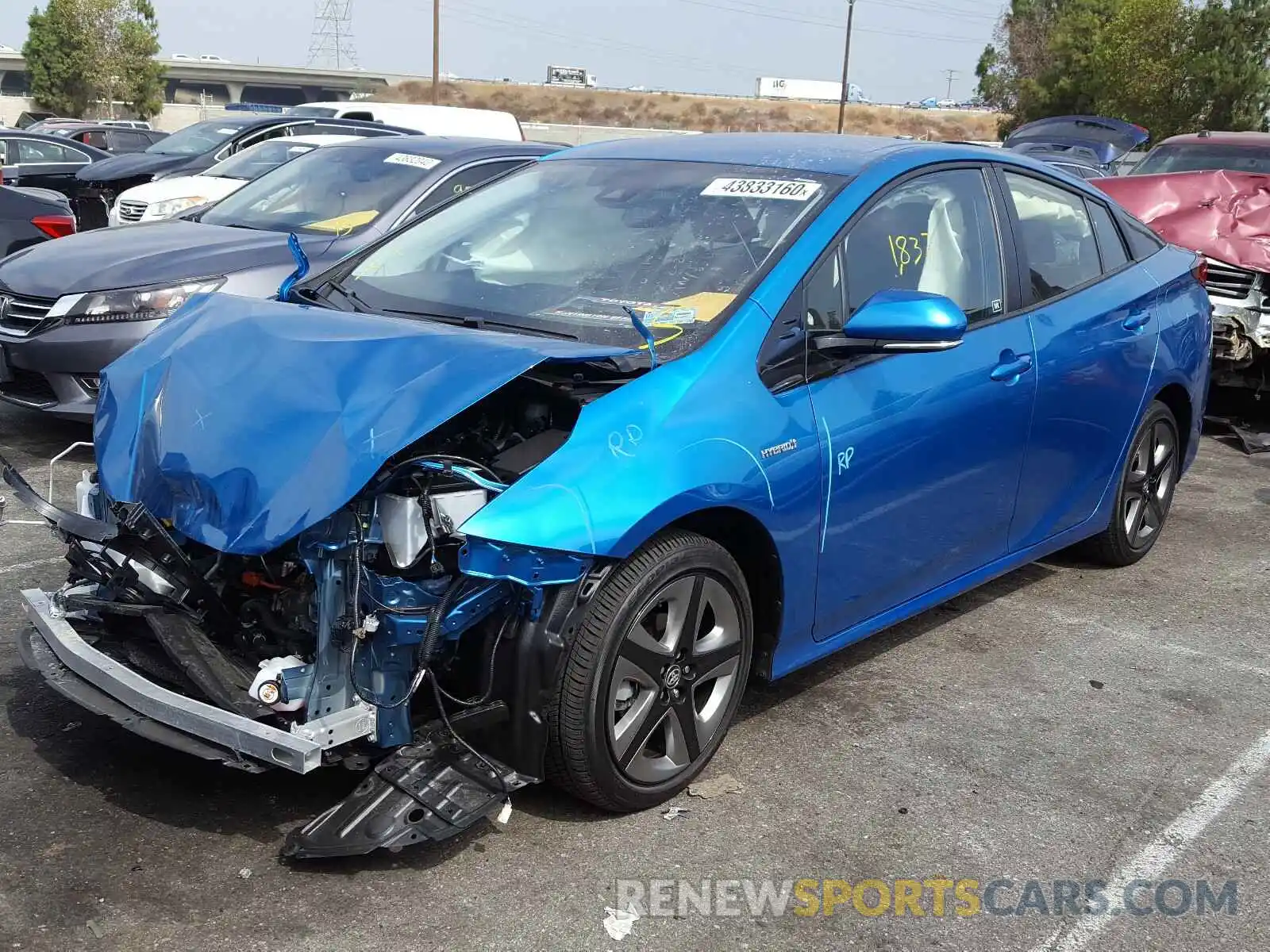 2 Photograph of a damaged car JTDKARFU5L3108542 TOYOTA PRIUS L 2020