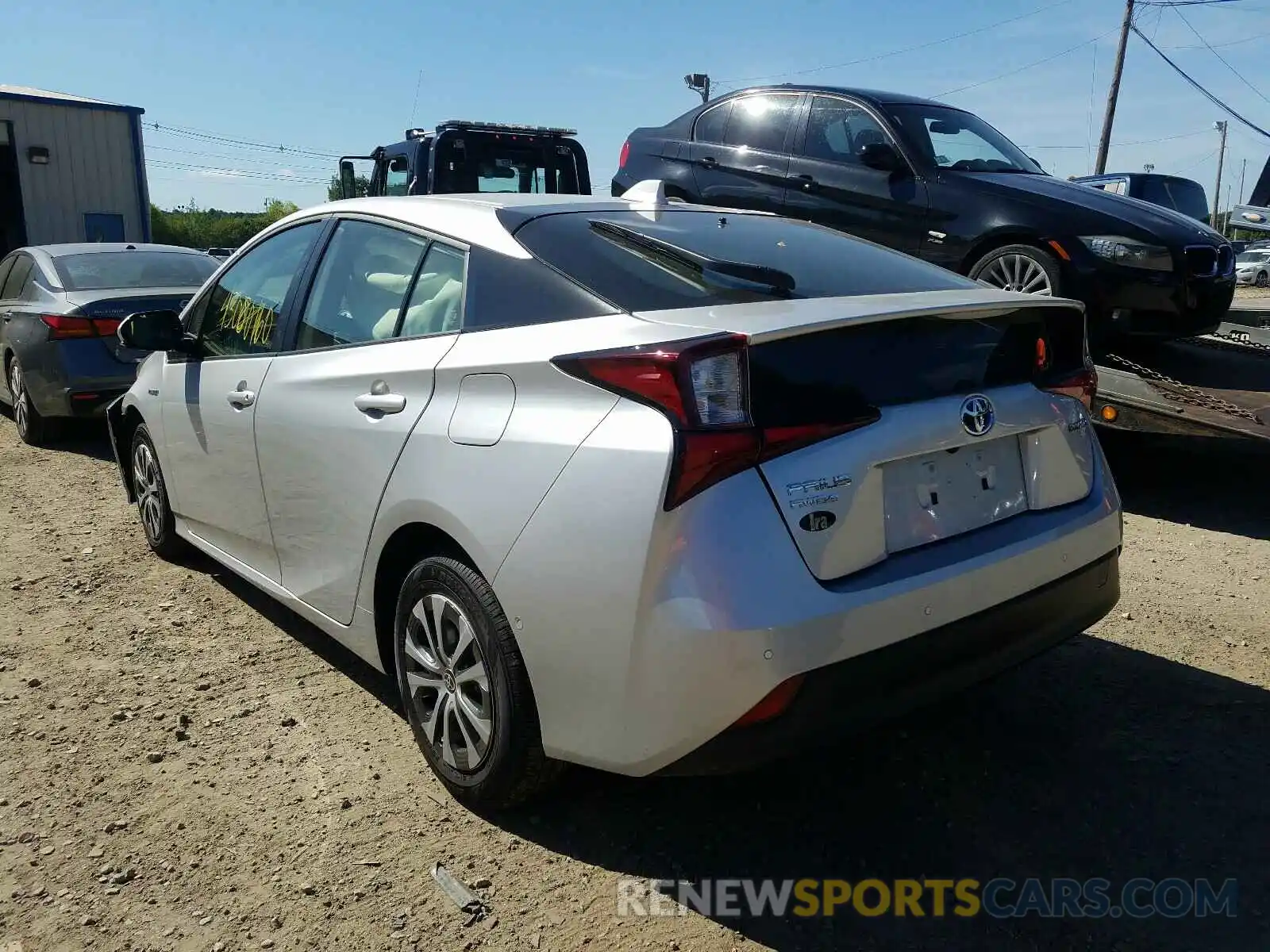 3 Photograph of a damaged car JTDL9RFU1L3021556 TOYOTA PRIUS LE 2020