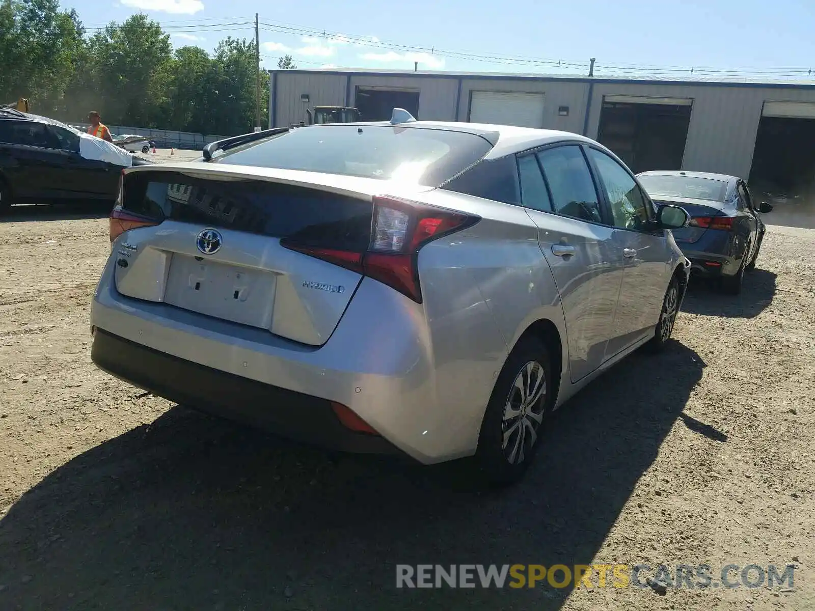 4 Photograph of a damaged car JTDL9RFU1L3021556 TOYOTA PRIUS LE 2020