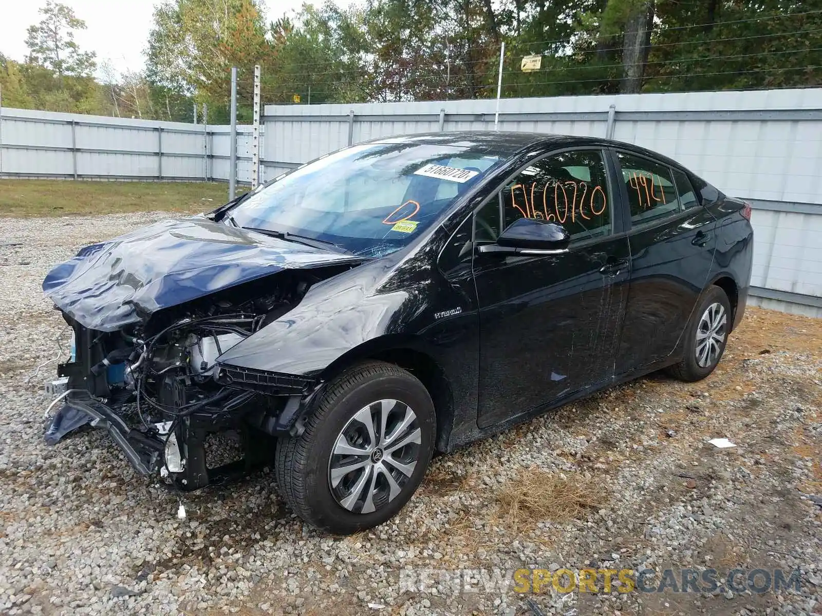 2 Photograph of a damaged car JTDL9RFU4L3017792 TOYOTA PRIUS LE 2020