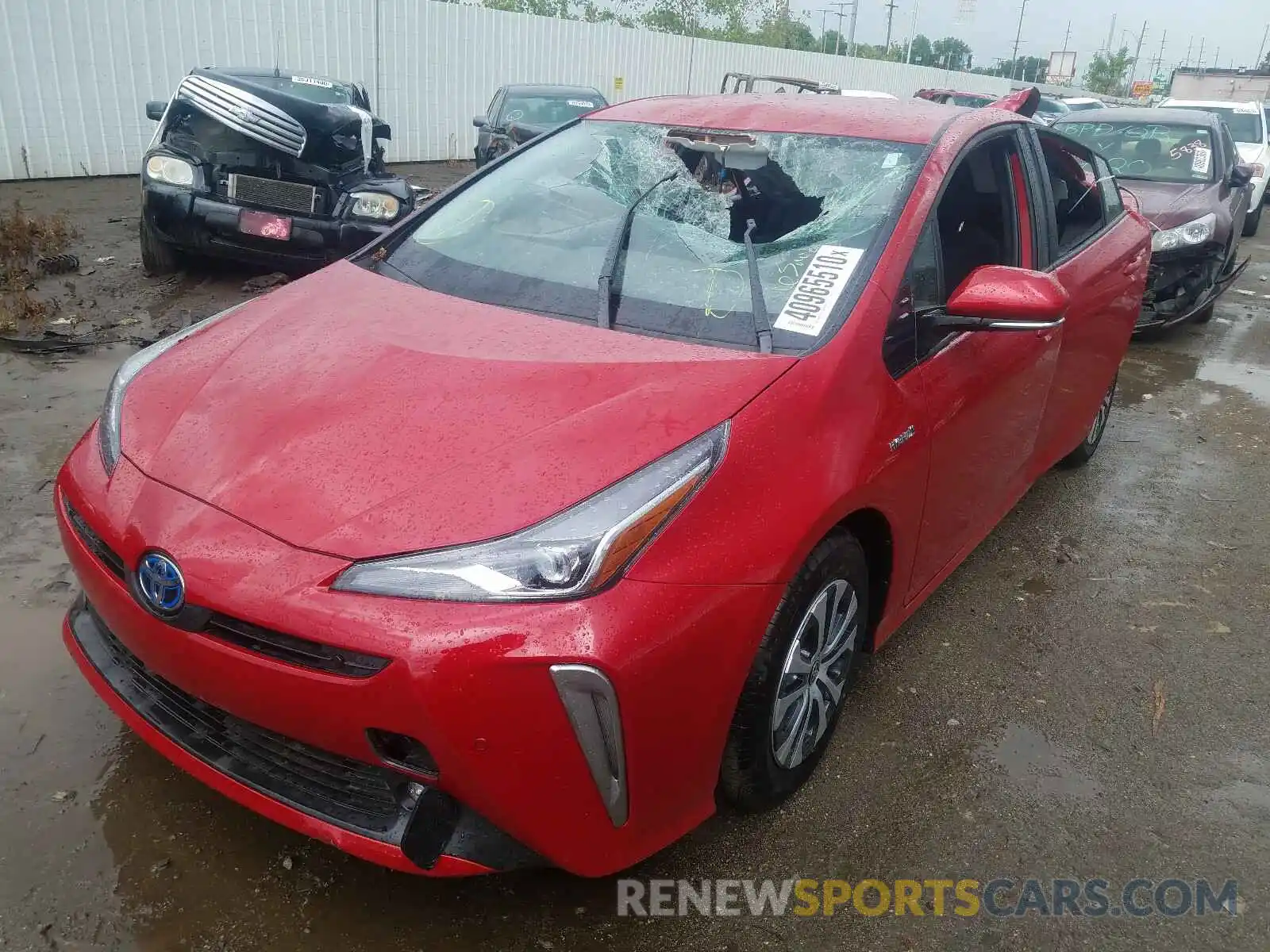 2 Photograph of a damaged car JTDL9RFU8L3019786 TOYOTA PRIUS LE 2020