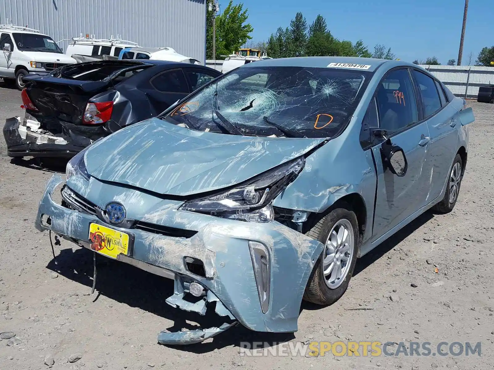 2 Photograph of a damaged car JTDL9RFU9L3018887 TOYOTA PRIUS LE 2020