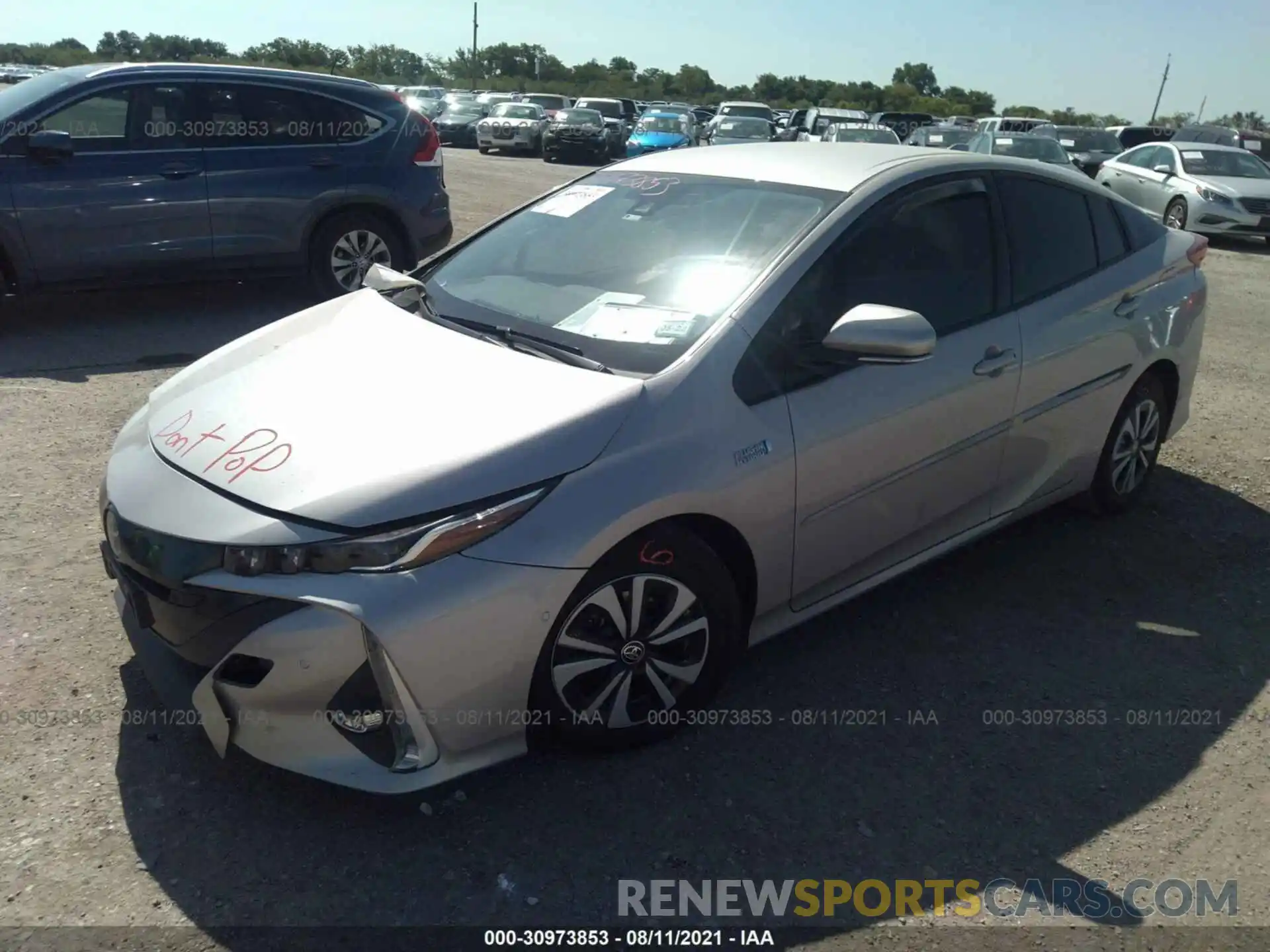 2 Photograph of a damaged car JTDKARFP0K3105282 TOYOTA PRIUS PRIME 2019