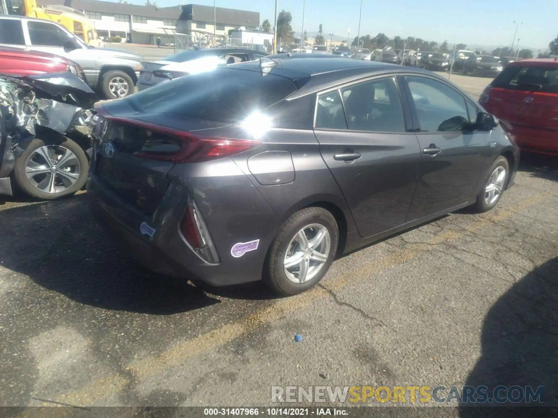 4 Photograph of a damaged car JTDKARFP0K3106240 TOYOTA PRIUS PRIME 2019