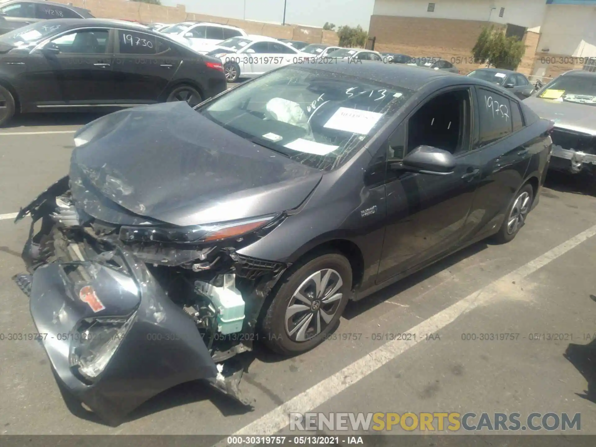 2 Photograph of a damaged car JTDKARFP0K3108862 TOYOTA PRIUS PRIME 2019