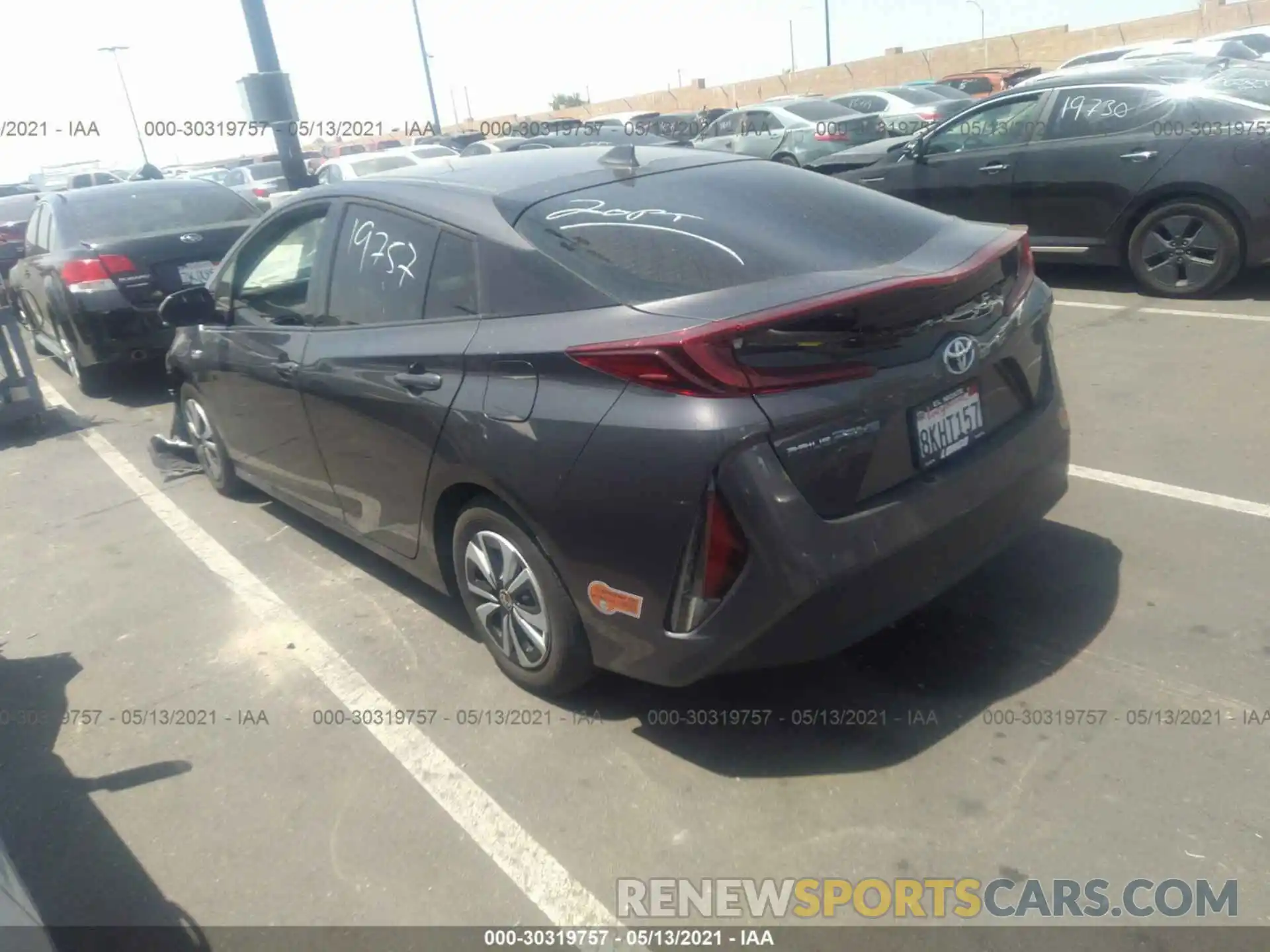 3 Photograph of a damaged car JTDKARFP0K3108862 TOYOTA PRIUS PRIME 2019