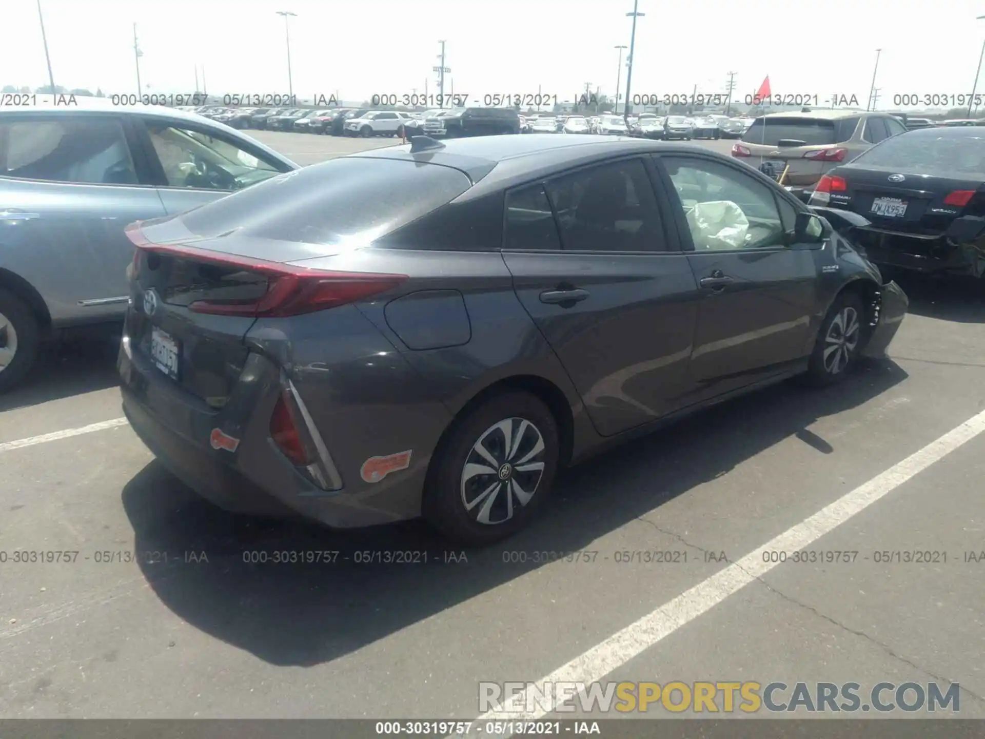 4 Photograph of a damaged car JTDKARFP0K3108862 TOYOTA PRIUS PRIME 2019