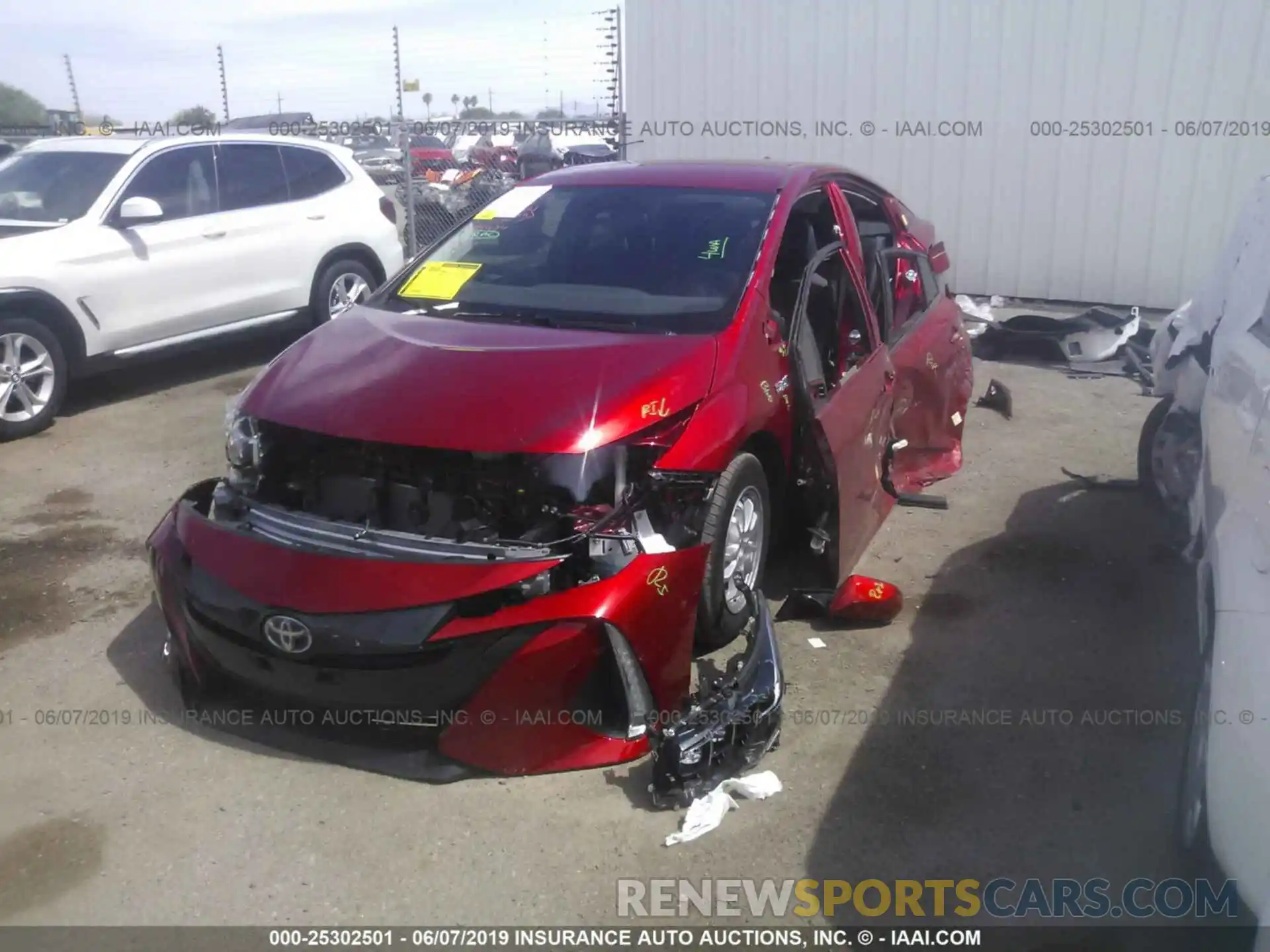 2 Photograph of a damaged car JTDKARFP0K3110160 TOYOTA PRIUS PRIME 2019