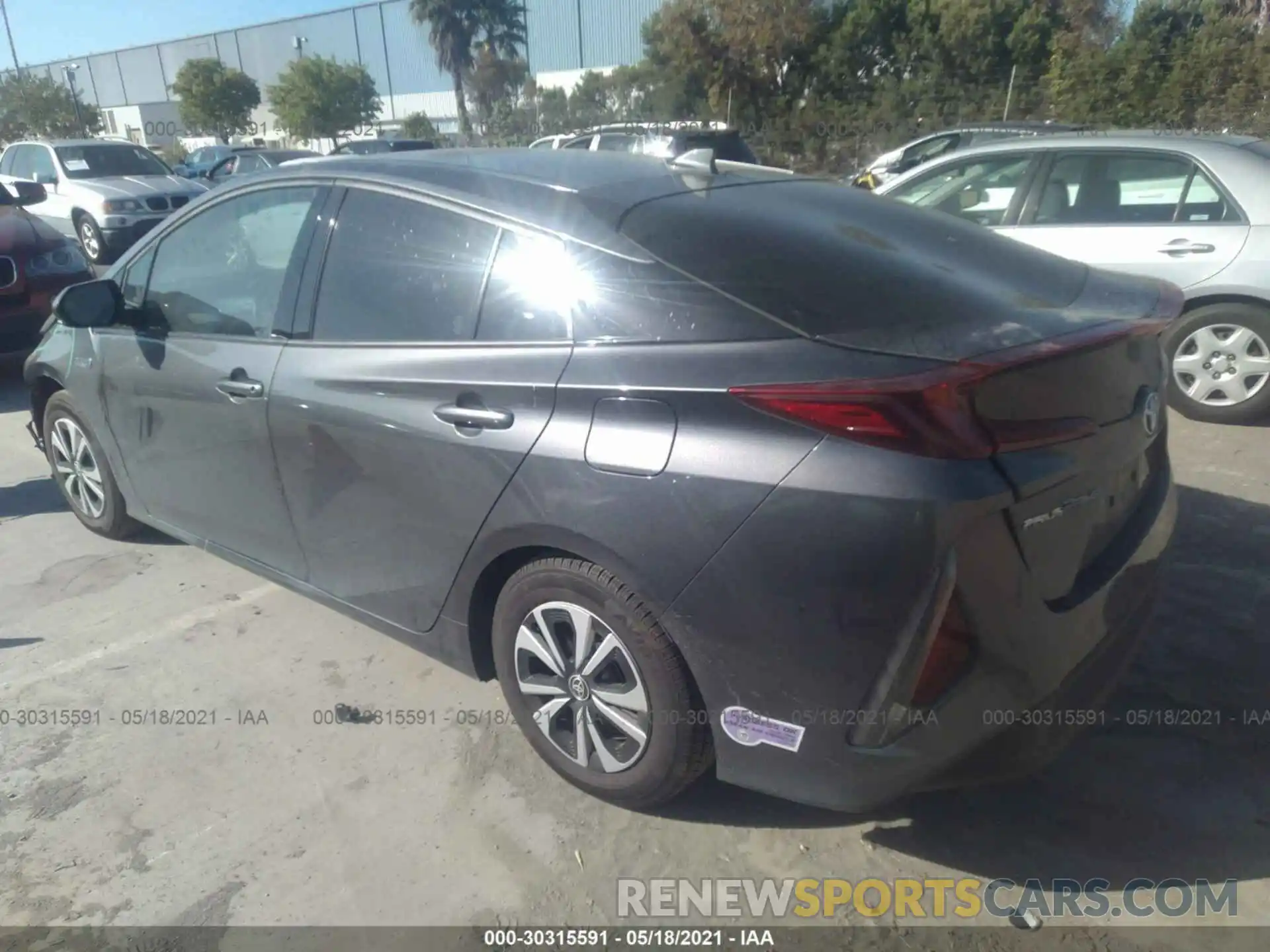 3 Photograph of a damaged car JTDKARFP0K3116735 TOYOTA PRIUS PRIME 2019