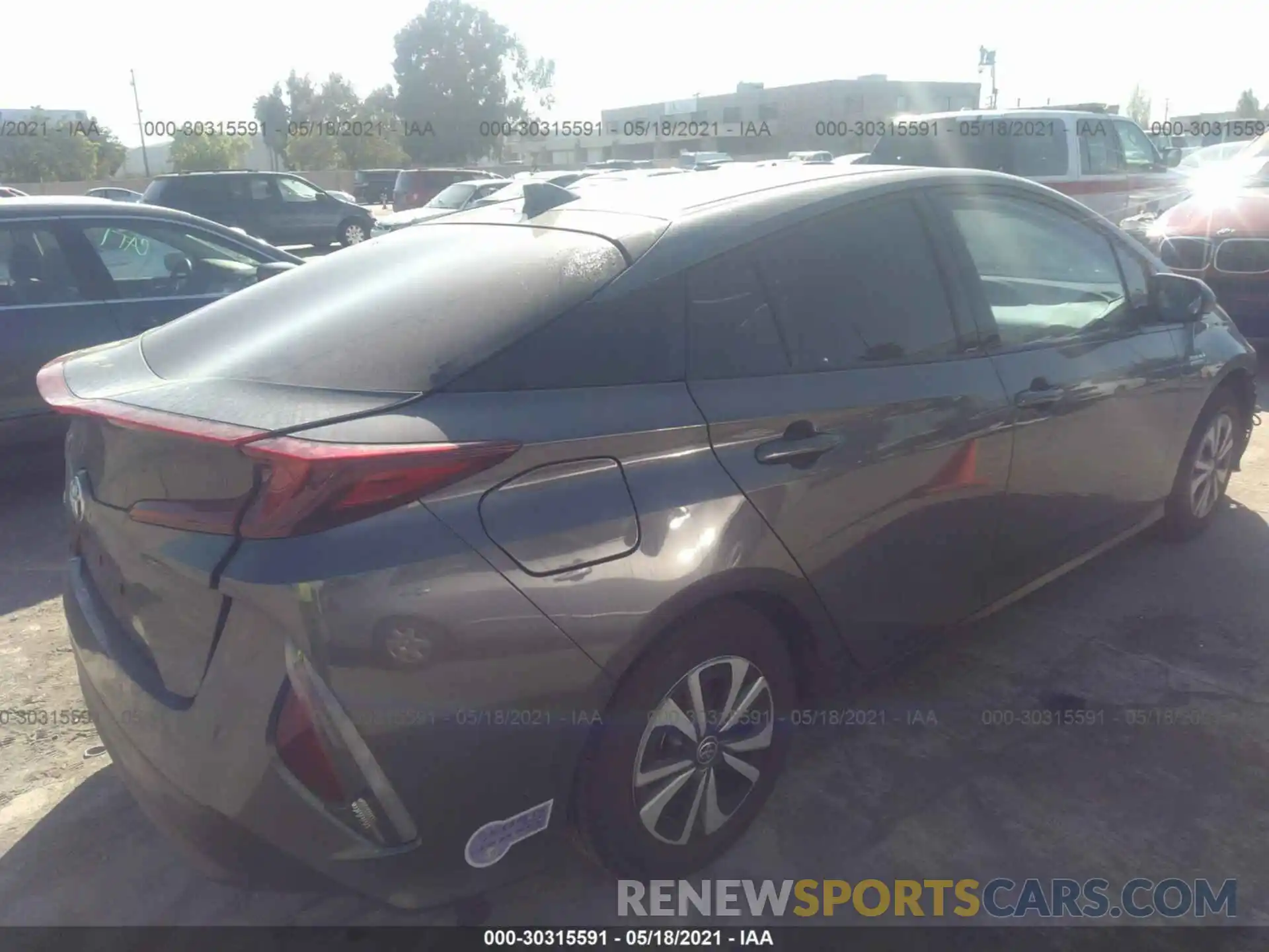 4 Photograph of a damaged car JTDKARFP0K3116735 TOYOTA PRIUS PRIME 2019