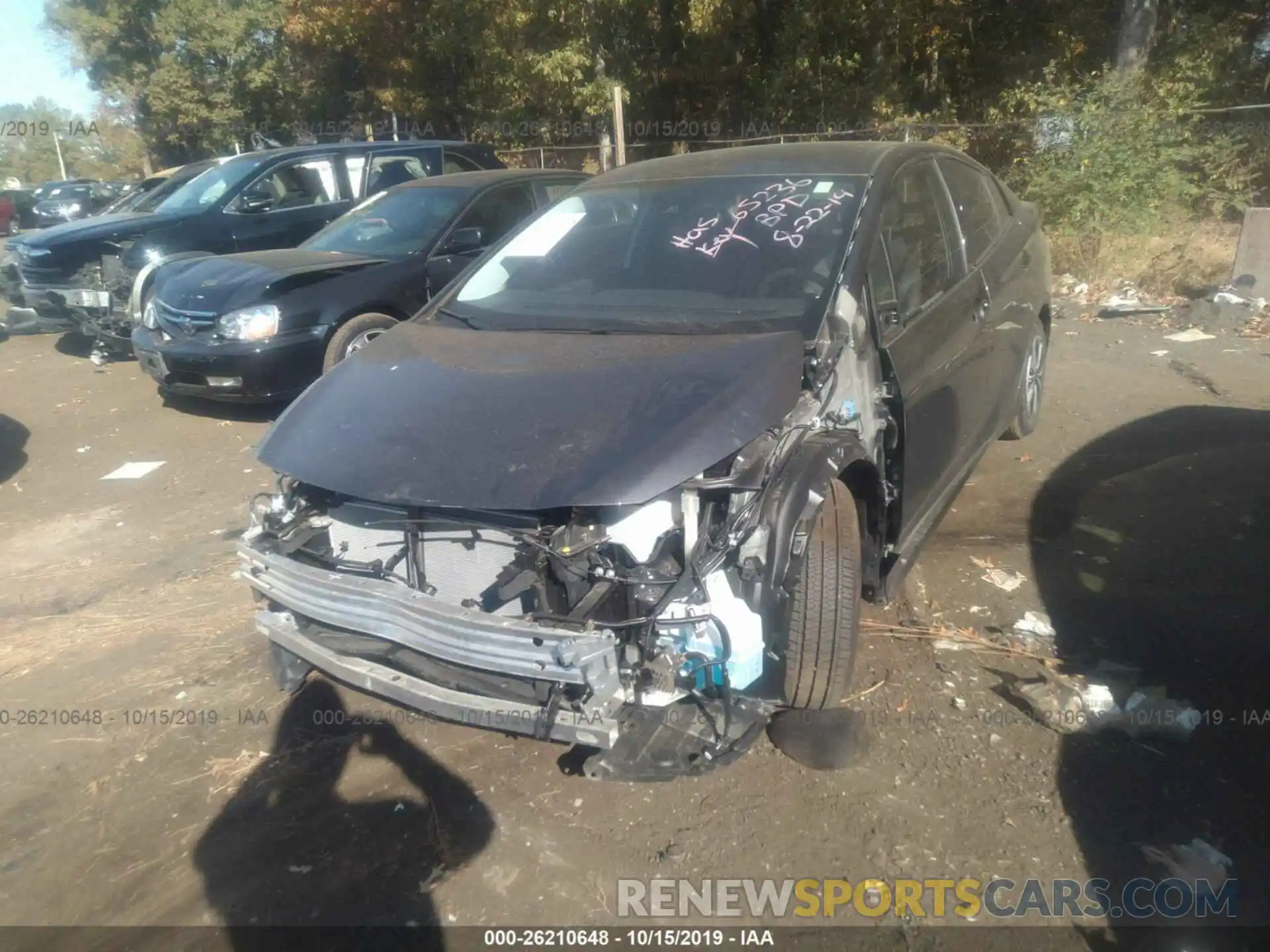 6 Photograph of a damaged car JTDKARFP1K3111477 TOYOTA PRIUS PRIME 2019