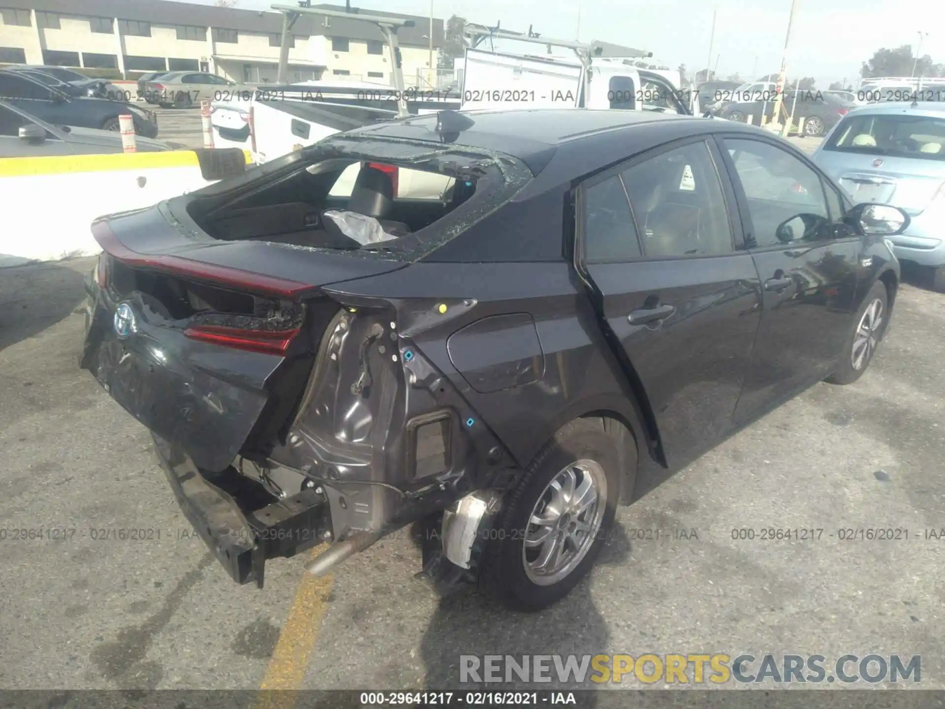 4 Photograph of a damaged car JTDKARFP1K3115447 TOYOTA PRIUS PRIME 2019