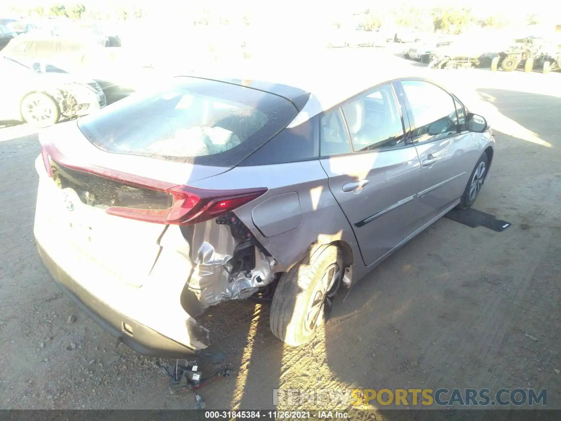 4 Photograph of a damaged car JTDKARFP1K3116338 TOYOTA PRIUS PRIME 2019