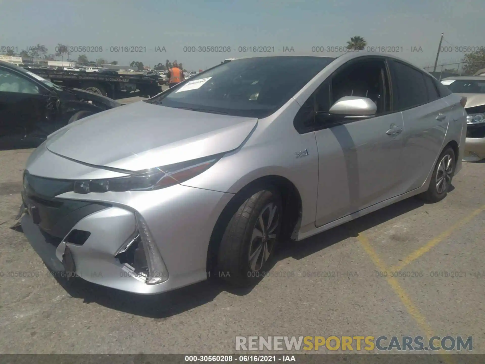 2 Photograph of a damaged car JTDKARFP2K3106255 TOYOTA PRIUS PRIME 2019