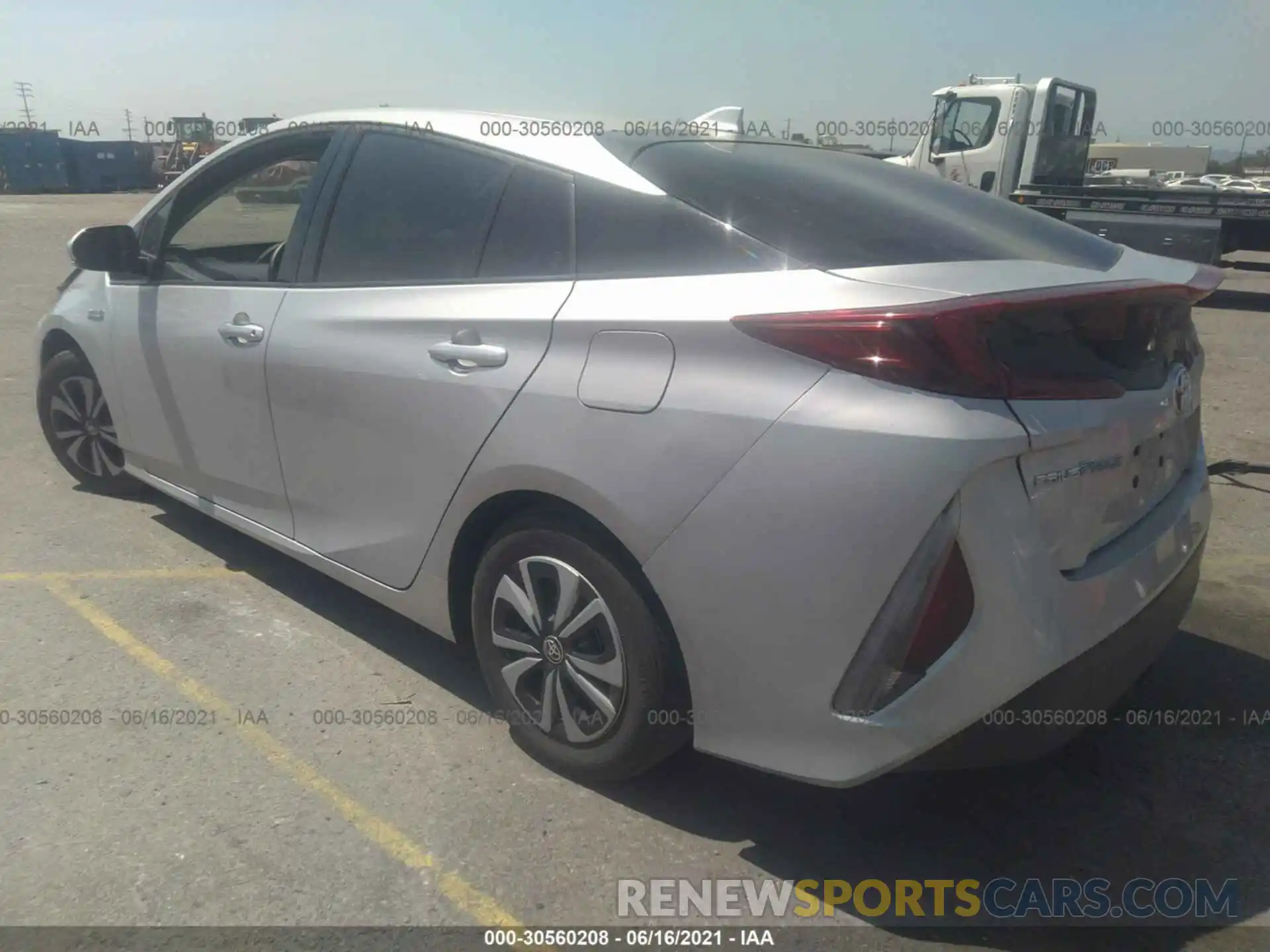 3 Photograph of a damaged car JTDKARFP2K3106255 TOYOTA PRIUS PRIME 2019