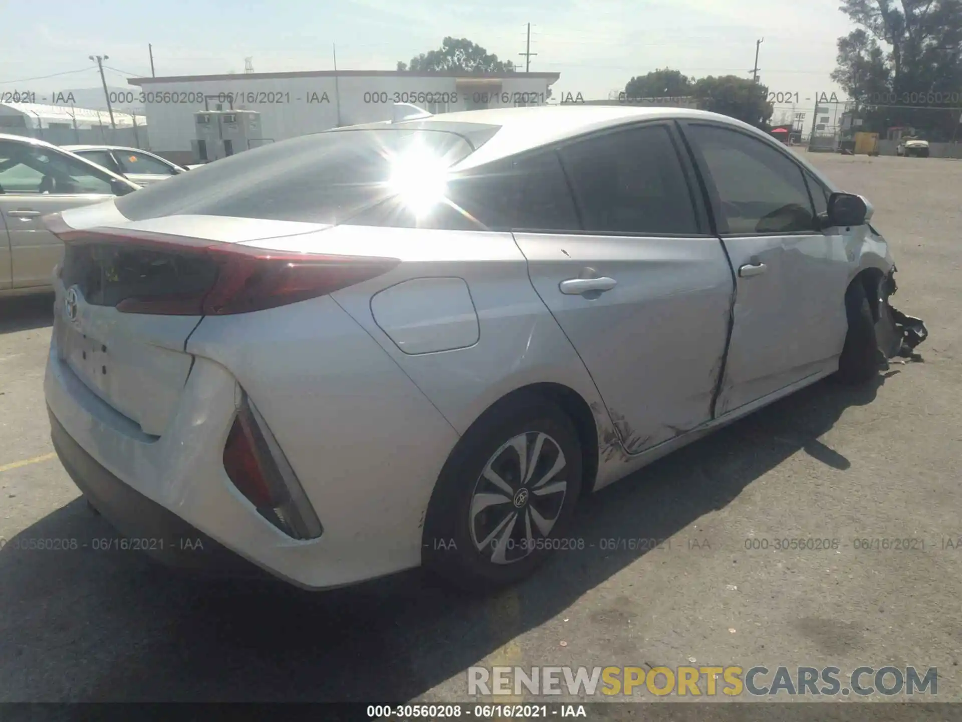 4 Photograph of a damaged car JTDKARFP2K3106255 TOYOTA PRIUS PRIME 2019