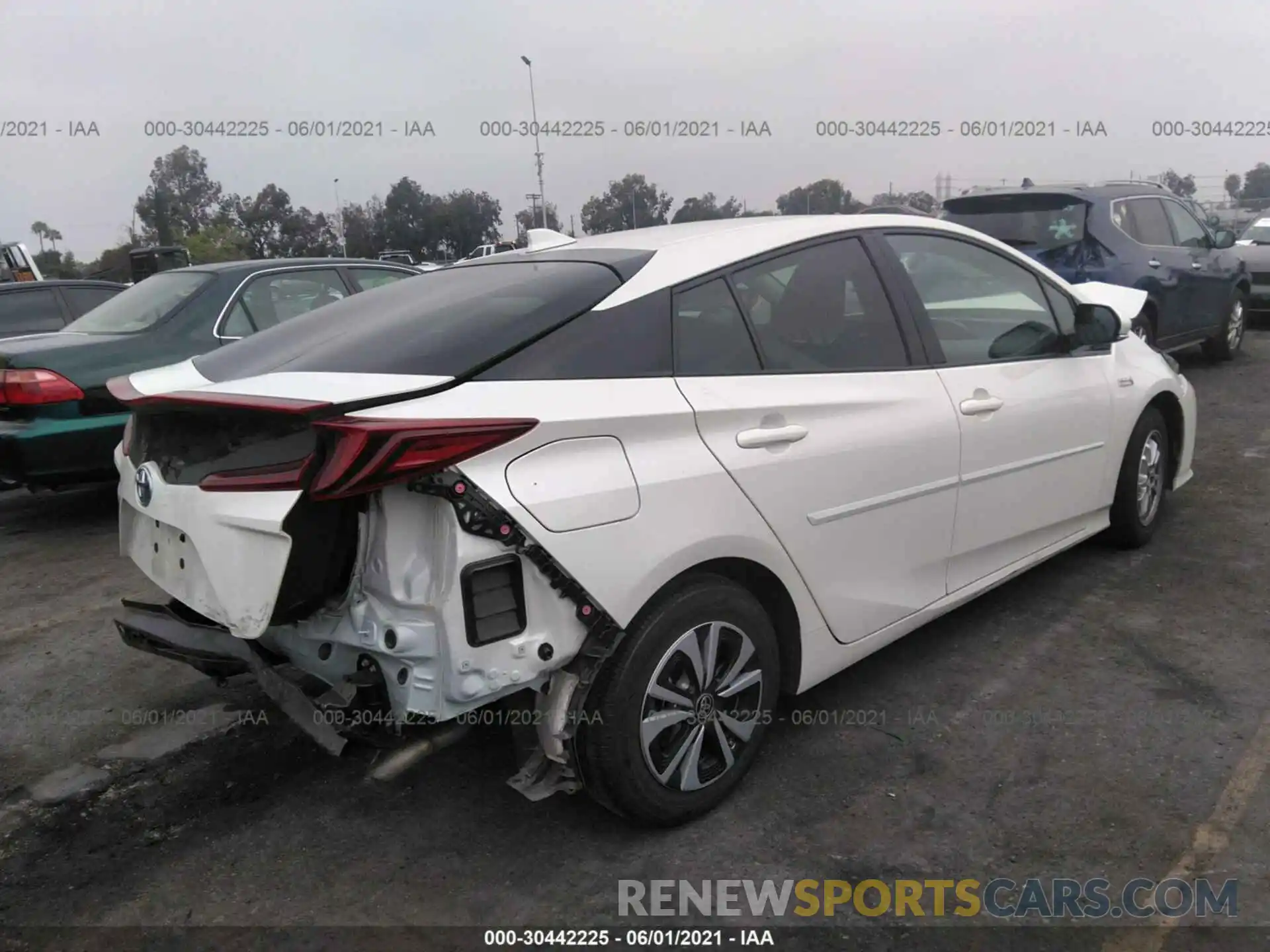 4 Photograph of a damaged car JTDKARFP2K3110340 TOYOTA PRIUS PRIME 2019