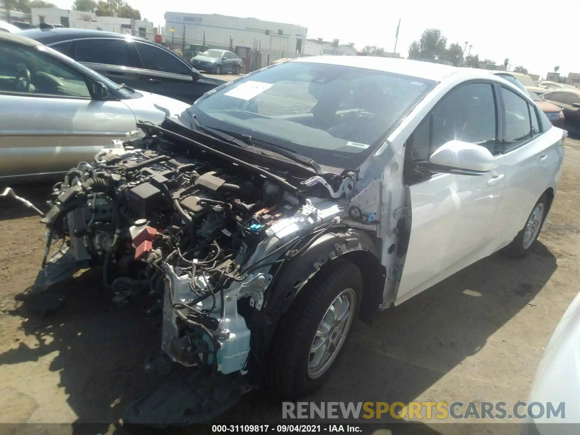 2 Photograph of a damaged car JTDKARFP2K3117532 TOYOTA PRIUS PRIME 2019