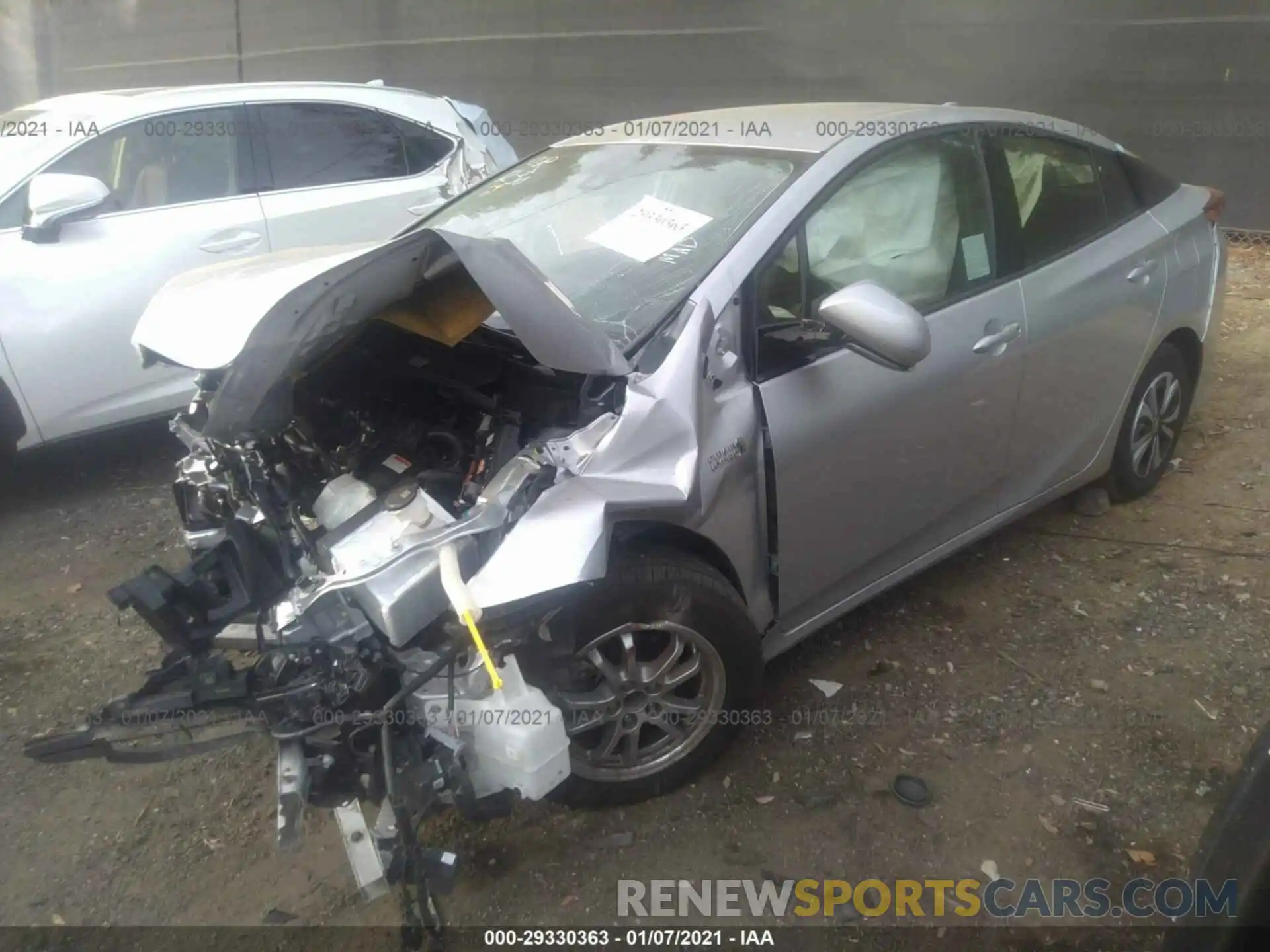 2 Photograph of a damaged car JTDKARFP3K3113554 TOYOTA PRIUS PRIME 2019