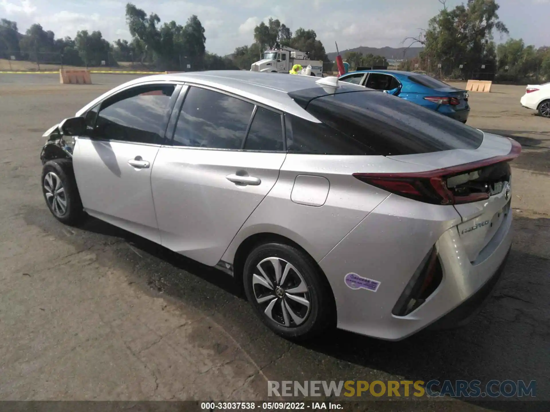 3 Photograph of a damaged car JTDKARFP3K3114784 TOYOTA PRIUS PRIME 2019