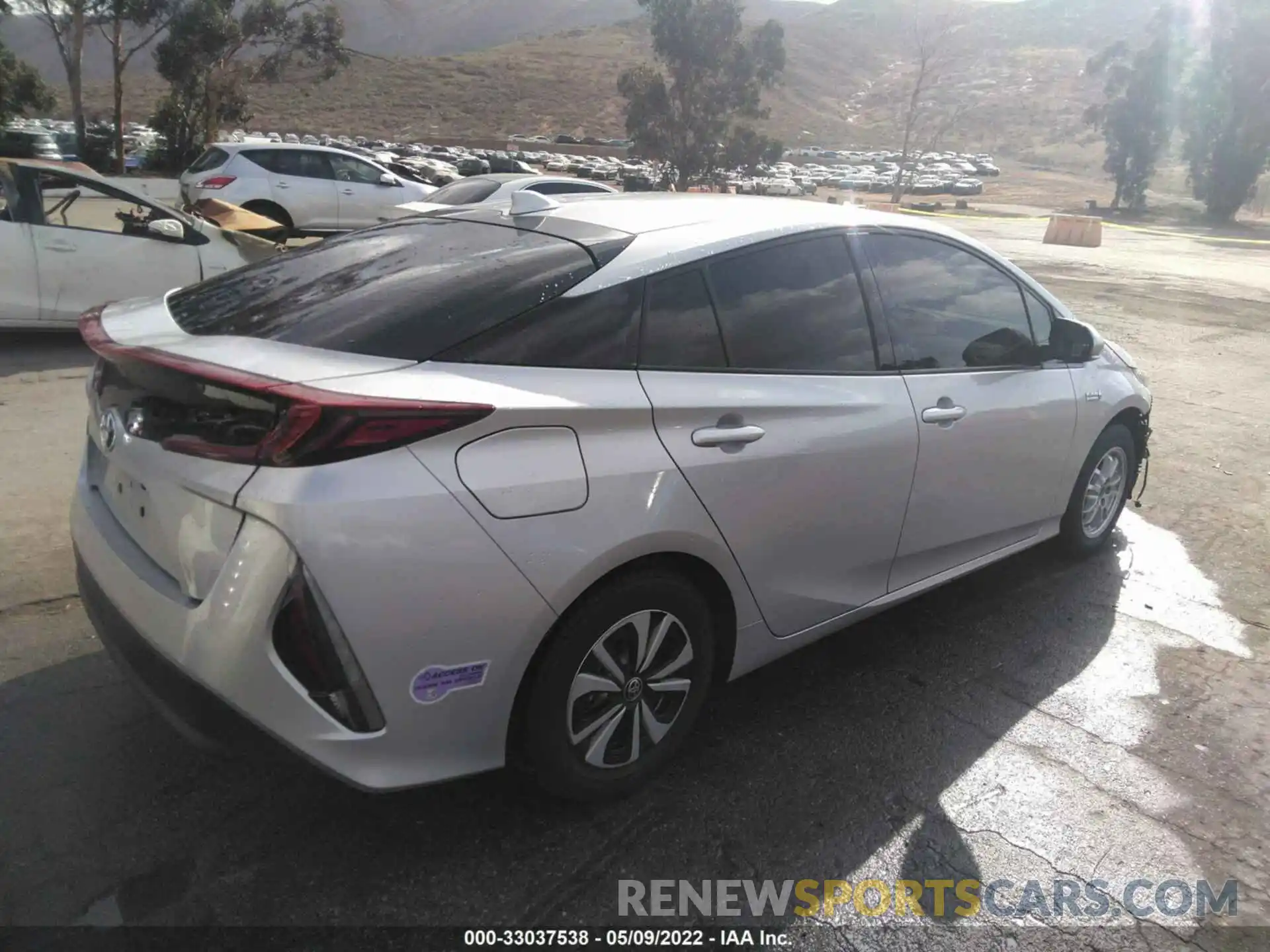 4 Photograph of a damaged car JTDKARFP3K3114784 TOYOTA PRIUS PRIME 2019