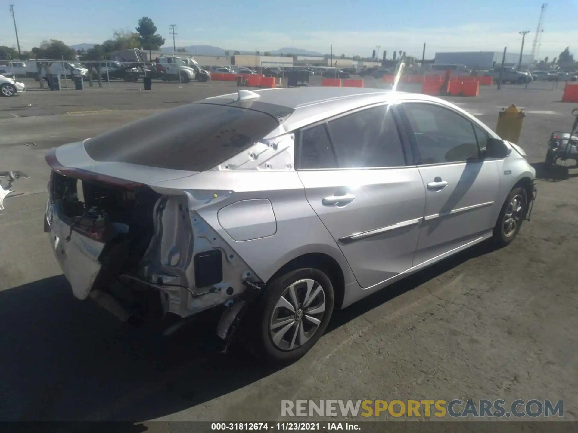 4 Photograph of a damaged car JTDKARFP3K3117118 TOYOTA PRIUS PRIME 2019