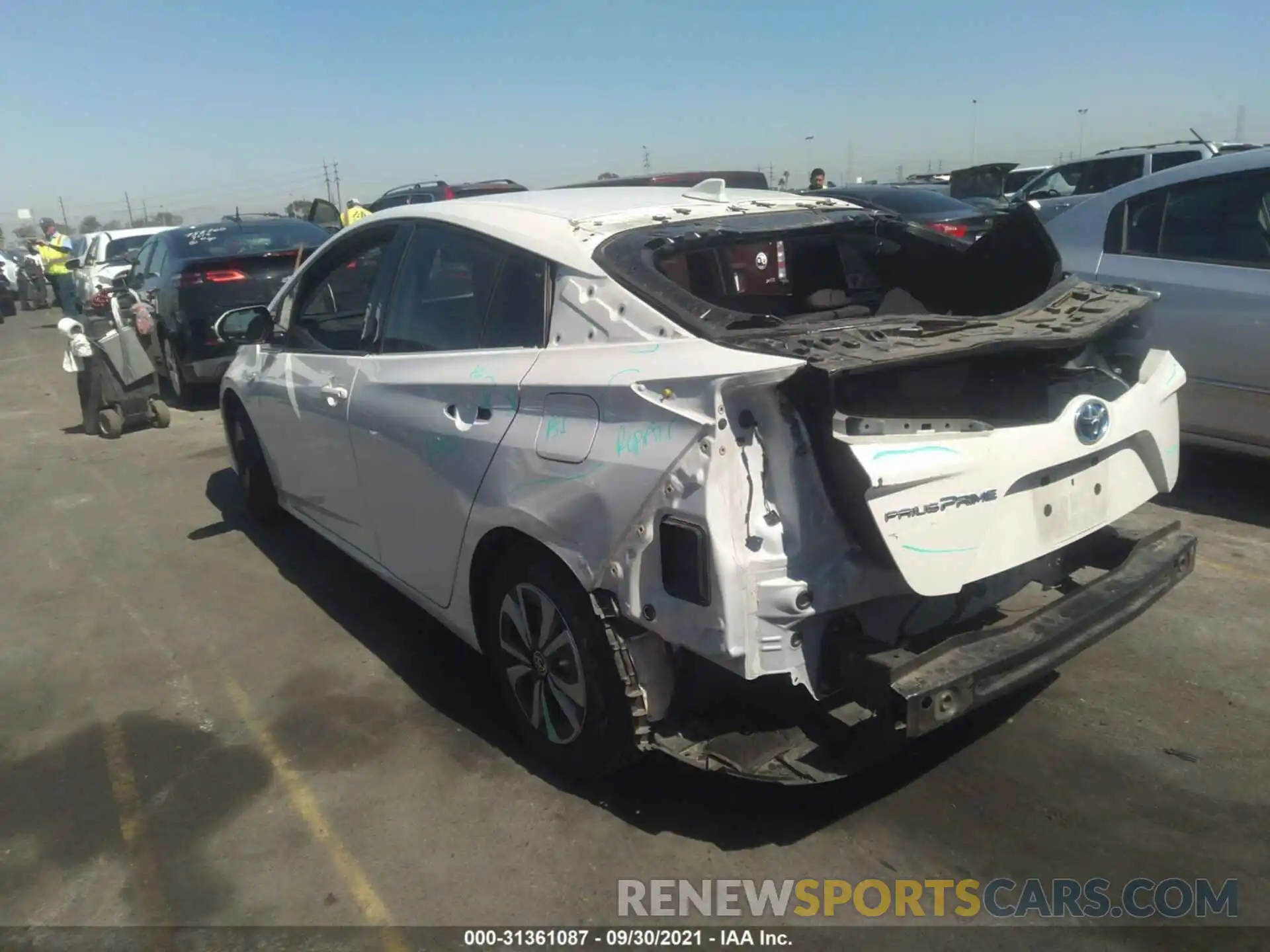 3 Photograph of a damaged car JTDKARFP4K3106144 TOYOTA PRIUS PRIME 2019