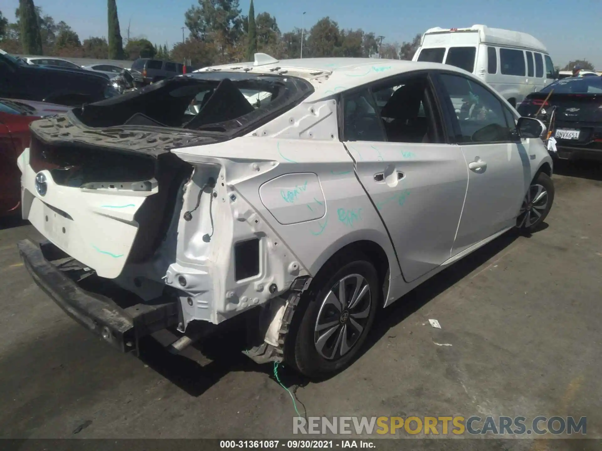 4 Photograph of a damaged car JTDKARFP4K3106144 TOYOTA PRIUS PRIME 2019